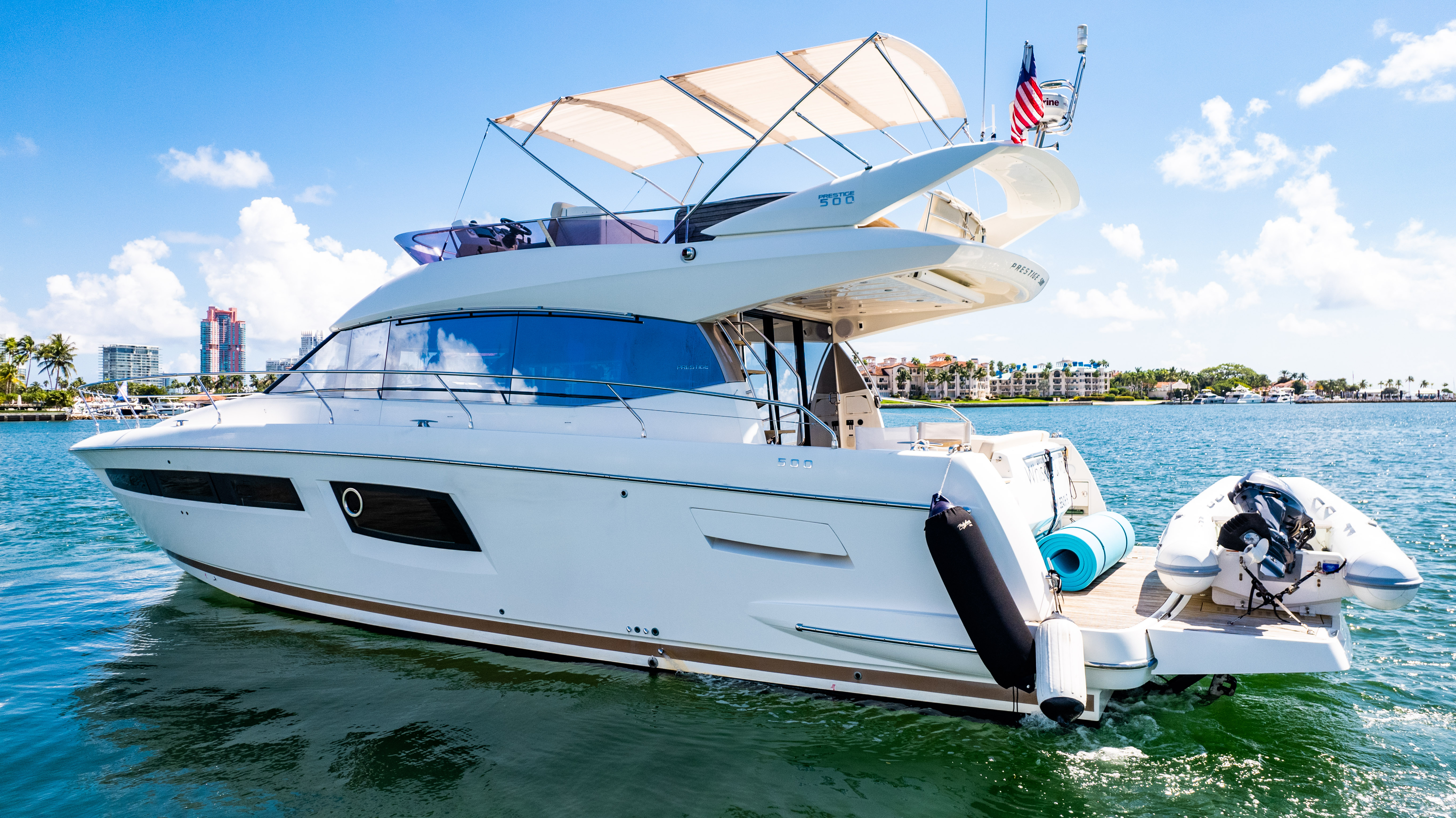 52ft Prestige (2017) - Bimini yacht rental Miami - comfortable lounge area for group celebrations