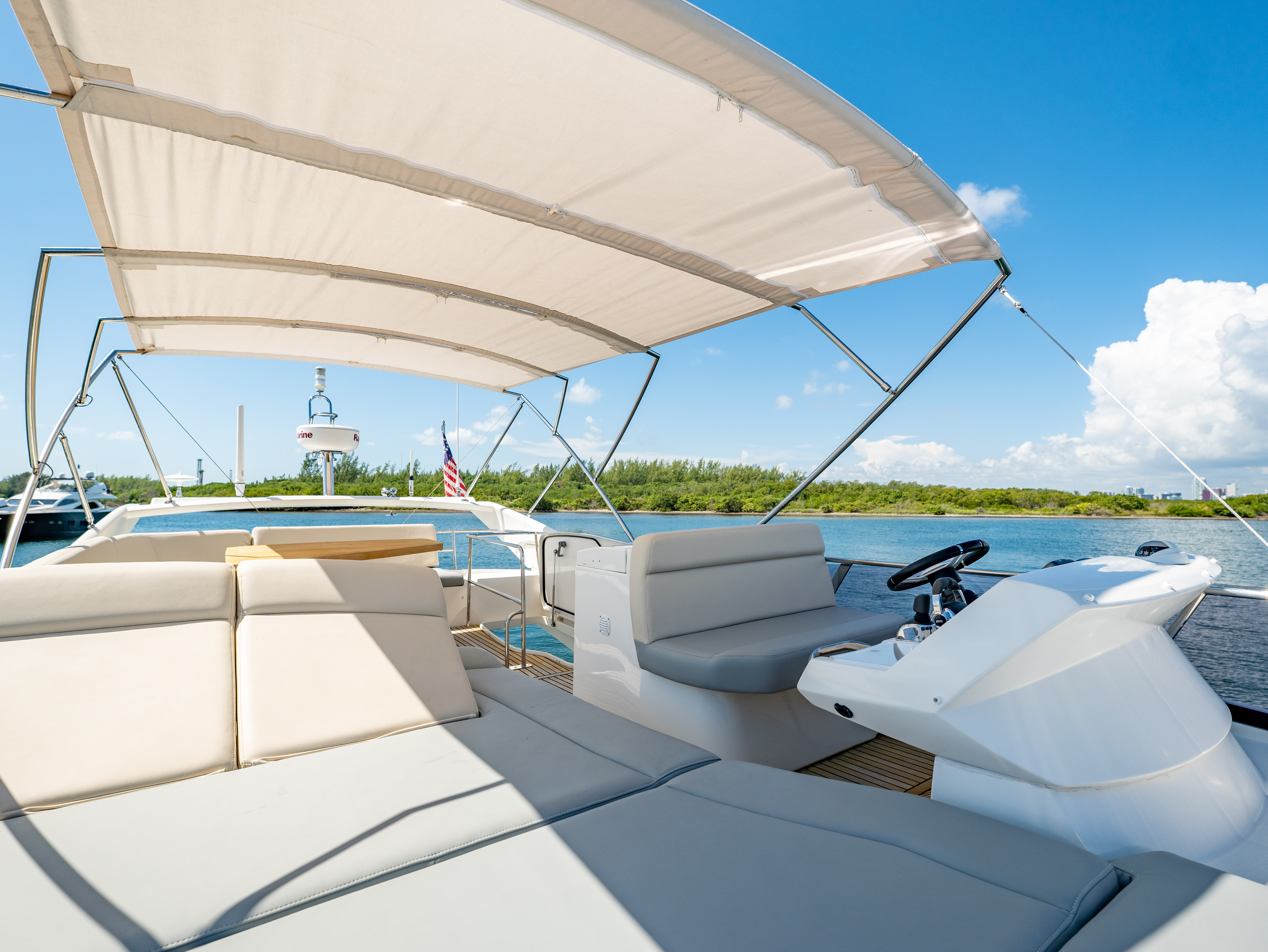 52ft Prestige (2017) - Bimini yacht rental Miami - comfortable lounge area for group celebrations