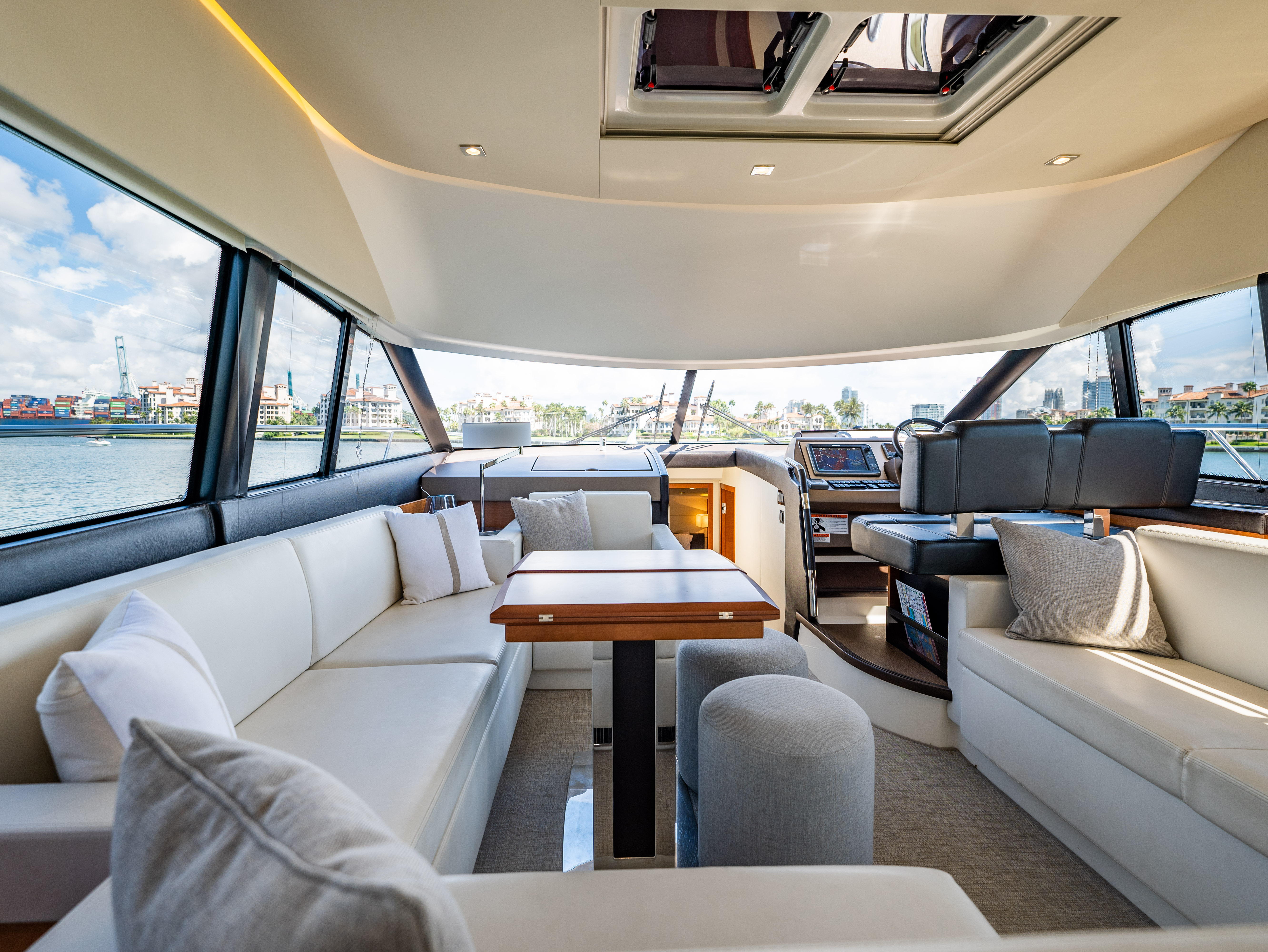 52ft Prestige (2017) - Bimini yacht rental Miami - elegant interior salon for corporate events and private gatherings