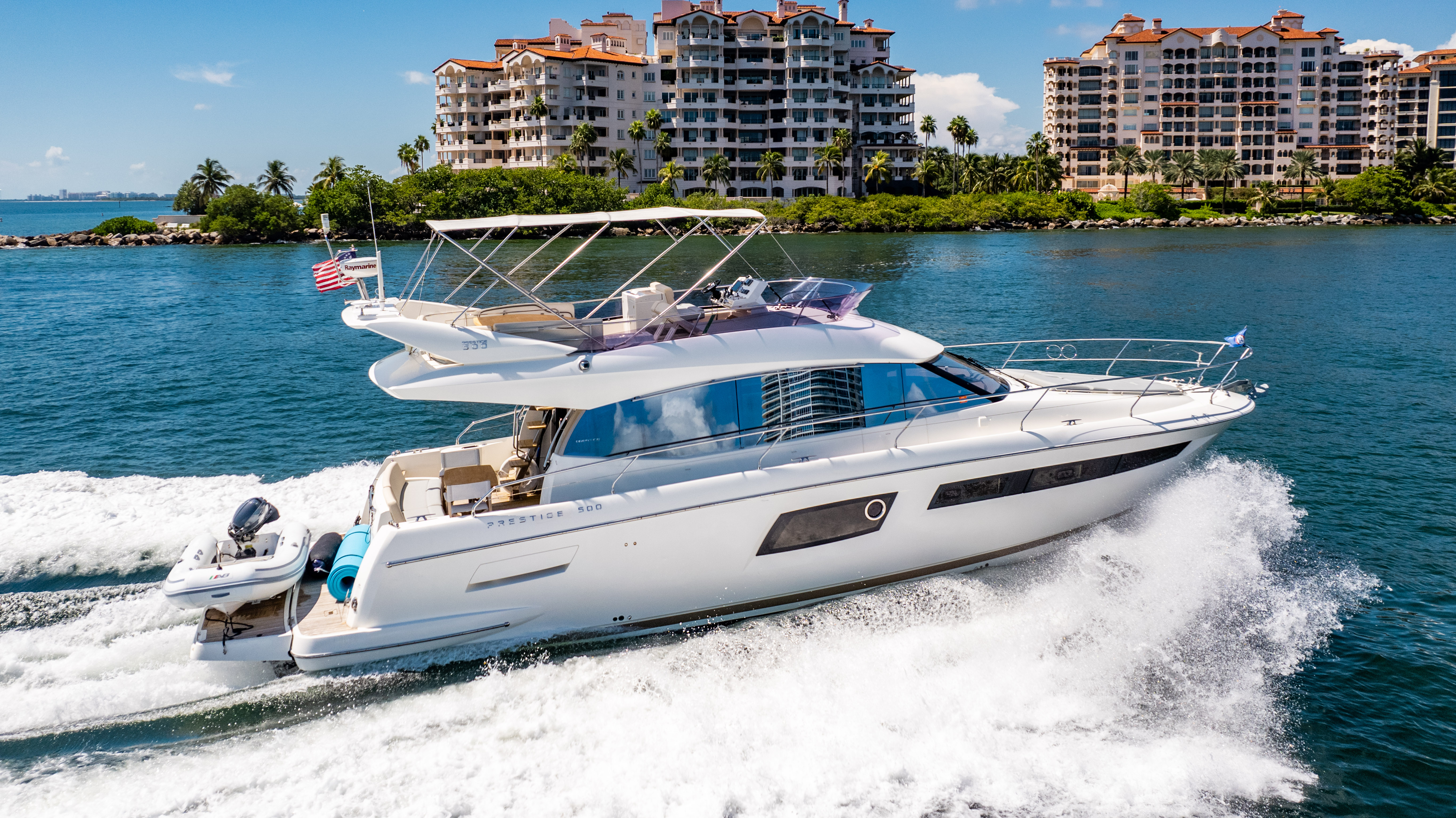 52ft Prestige (2017) - Bimini yacht rental Miami - bow seating area perfect for sunbathing and relaxation