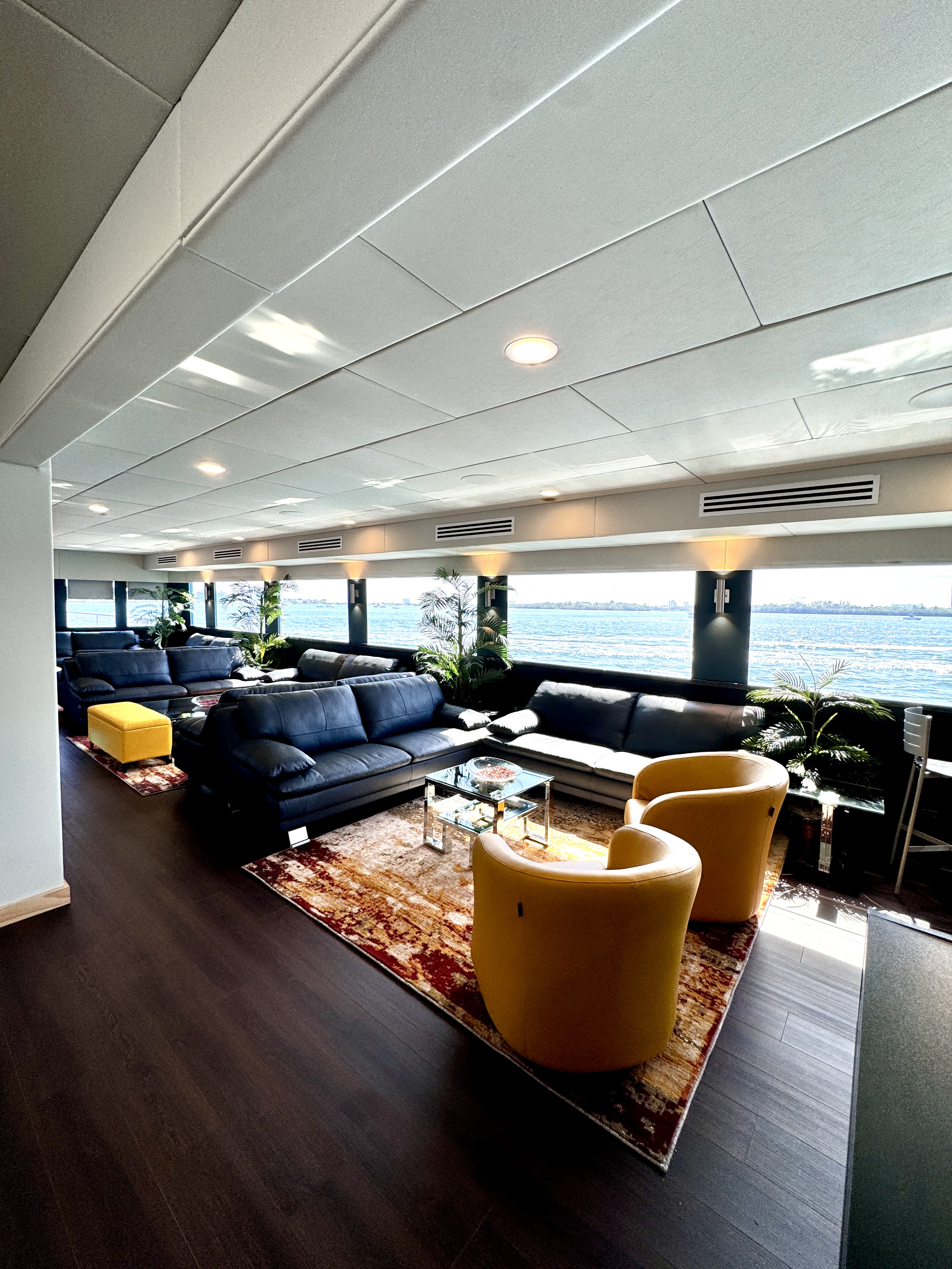 115ft Upus yacht rental Miami - comfortable lounge area for group celebrations