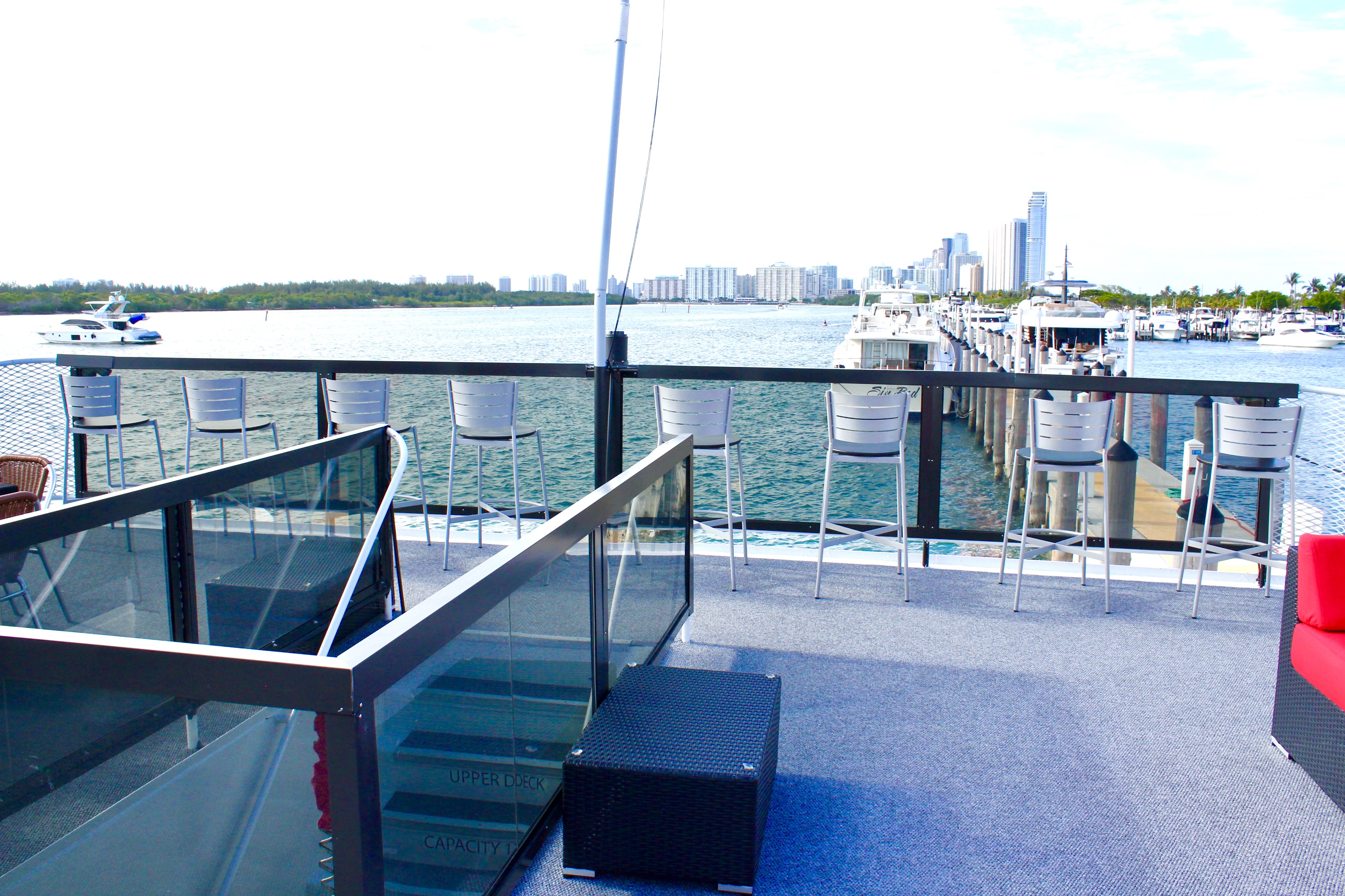 115ft Upus yacht rental Miami - elegant interior salon for corporate events and private gatherings
