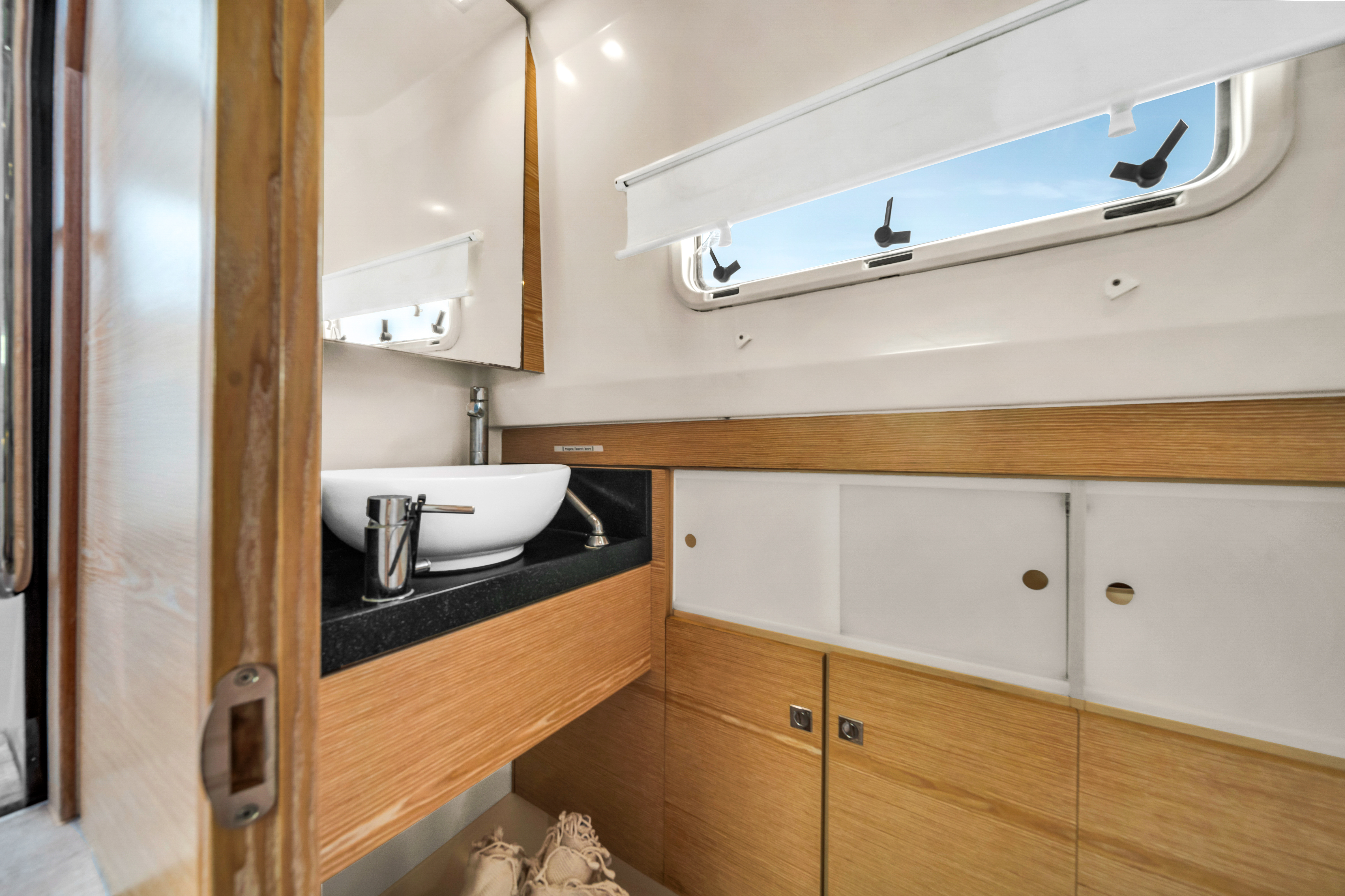40ft Fjord yacht rental Miami - bow seating area perfect for sunbathing and relaxation