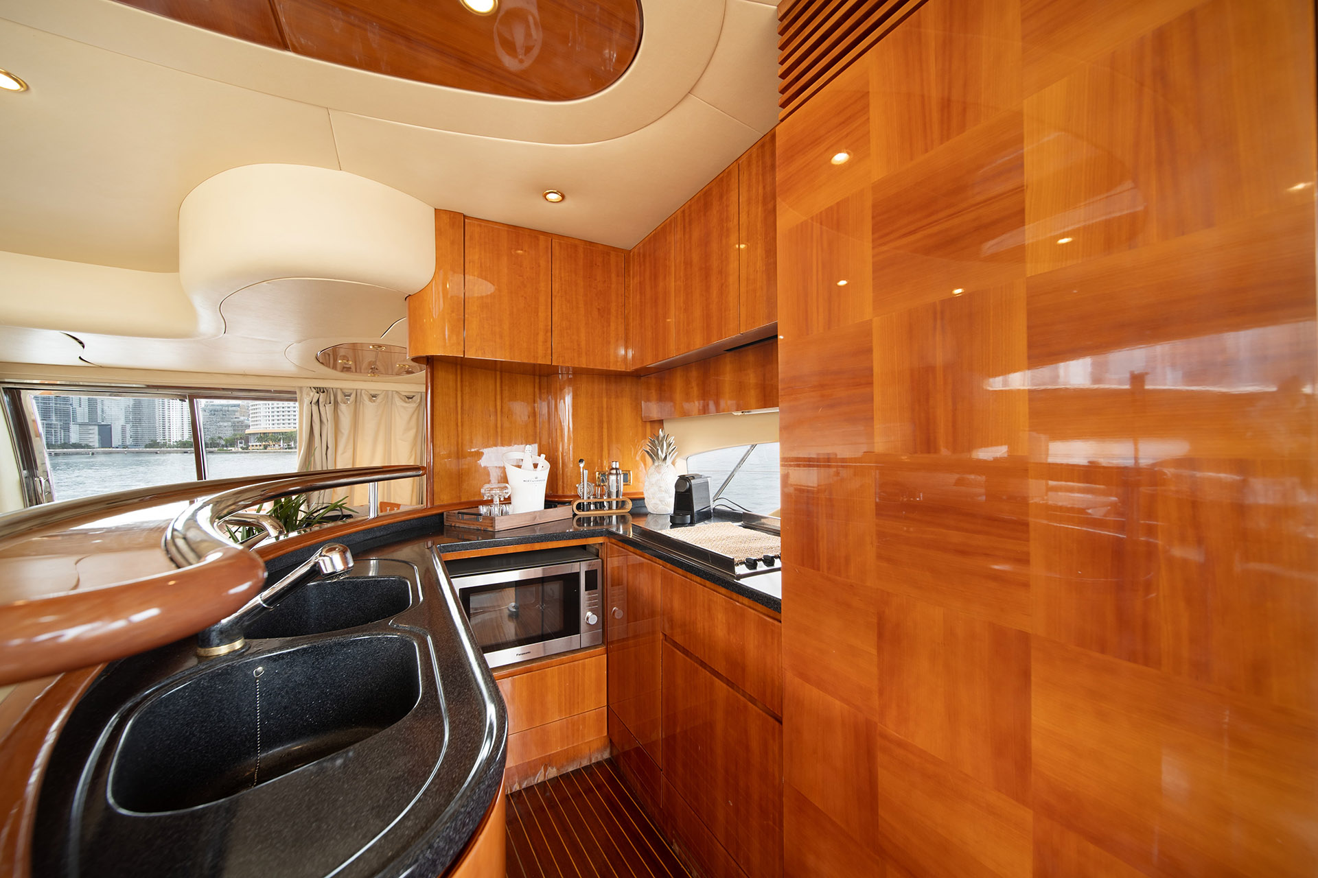 65ft Azimut U yacht rental Miami - flybridge with panoramic views of Miami skyline