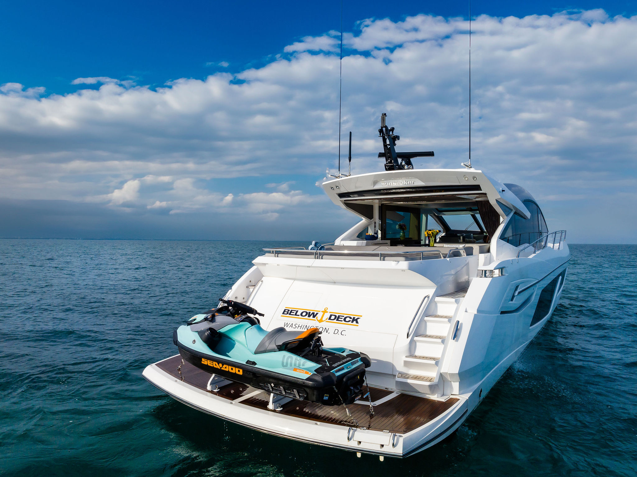 74ft Sunseeker yacht rental Miami - stern swim platform with water access for snorkeling