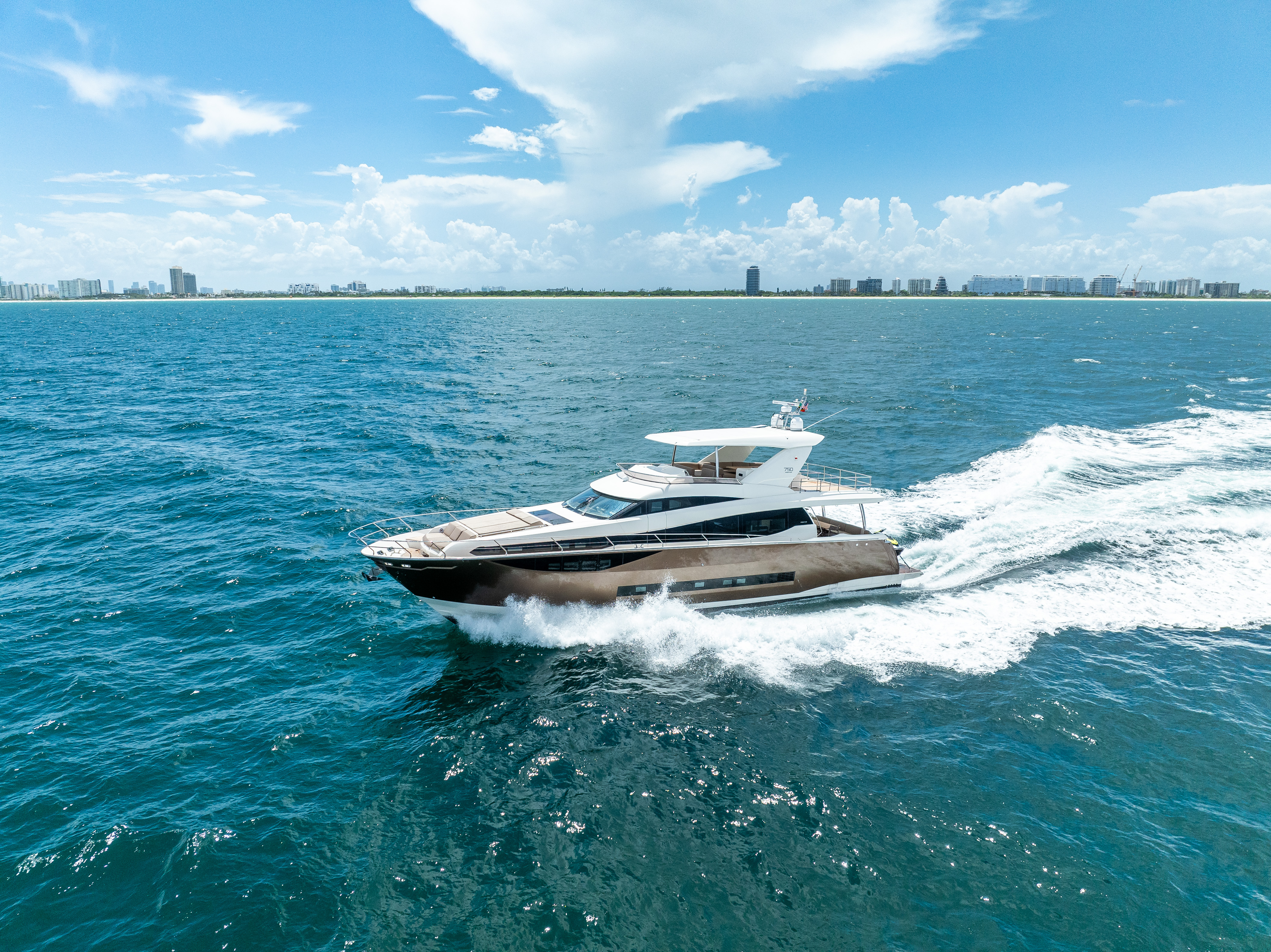 75ft Prestige yacht rental Miami - flybridge with panoramic views of Miami skyline