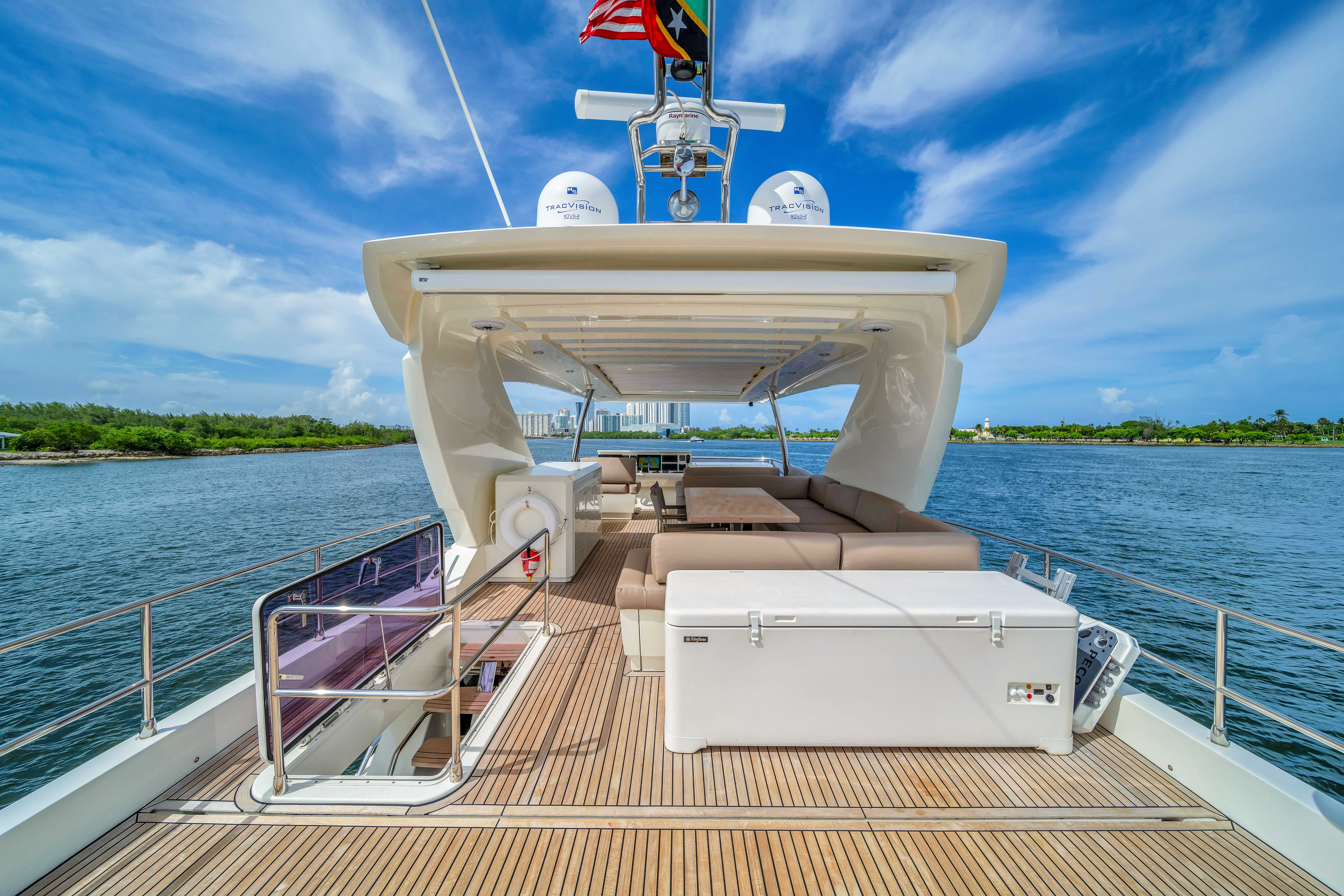 75ft Prestige yacht rental Miami - flybridge with panoramic views of Miami skyline