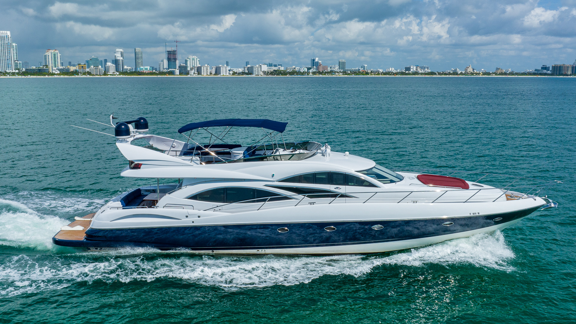 80ft Sunseeker yacht rental Miami - elegant interior salon for corporate events and private gatherings