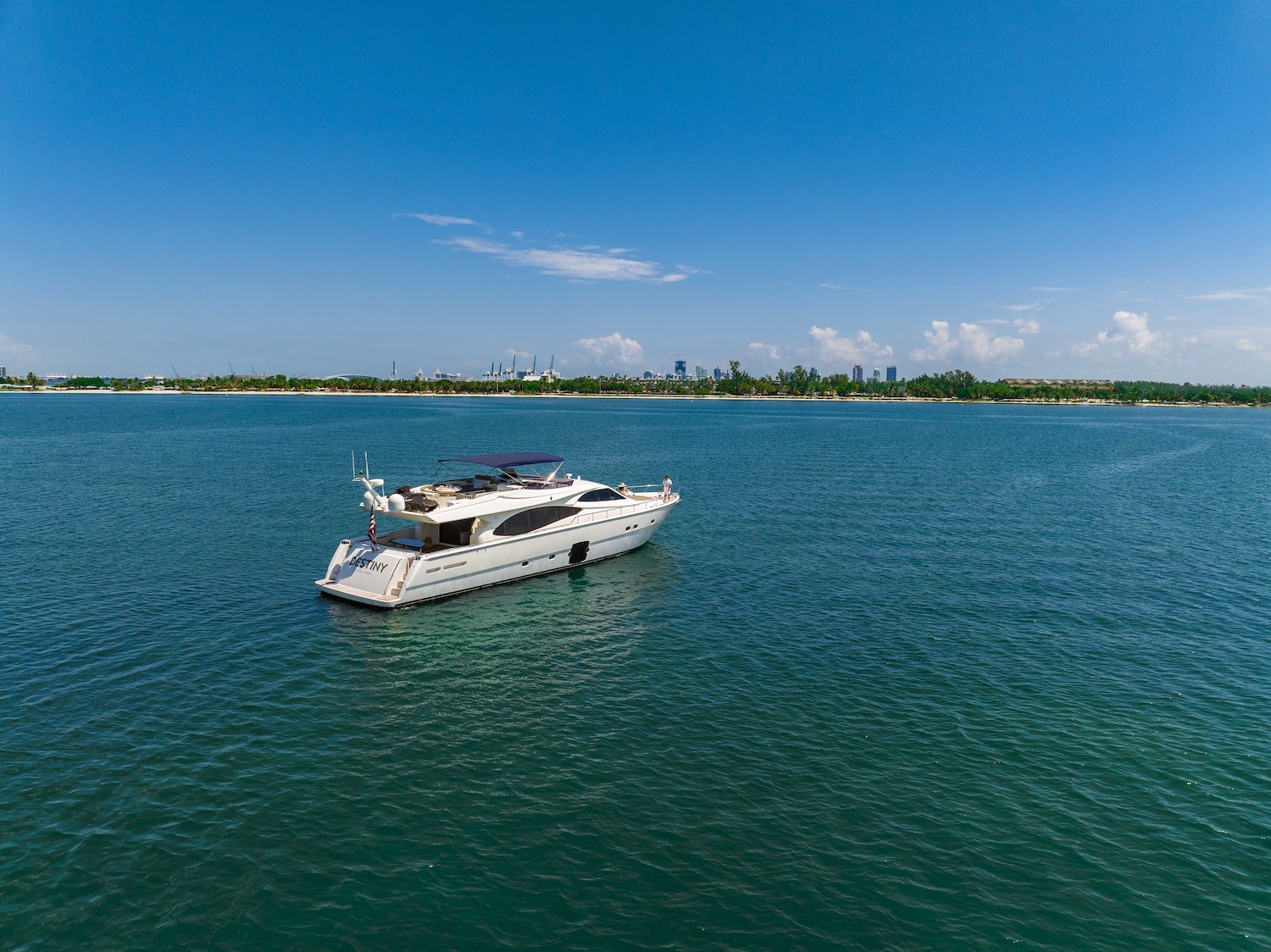 85ft Ferretti yacht rental Miami - spacious deck area ideal for sunset cruises and bachelorette parties