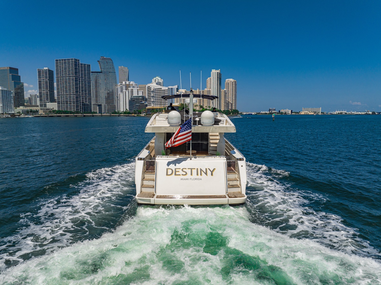 85ft Ferretti yacht rental Miami - elegant interior salon for corporate events and private gatherings