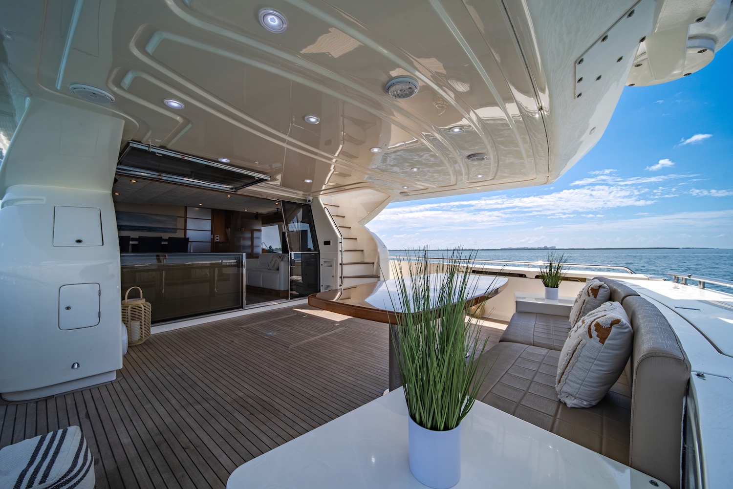 85ft Ferretti yacht rental Miami - comfortable lounge area for group celebrations