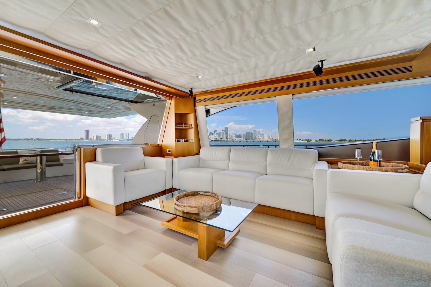 85ft Ferretti yacht rental Miami - spacious deck area ideal for sunset cruises and bachelorette parties