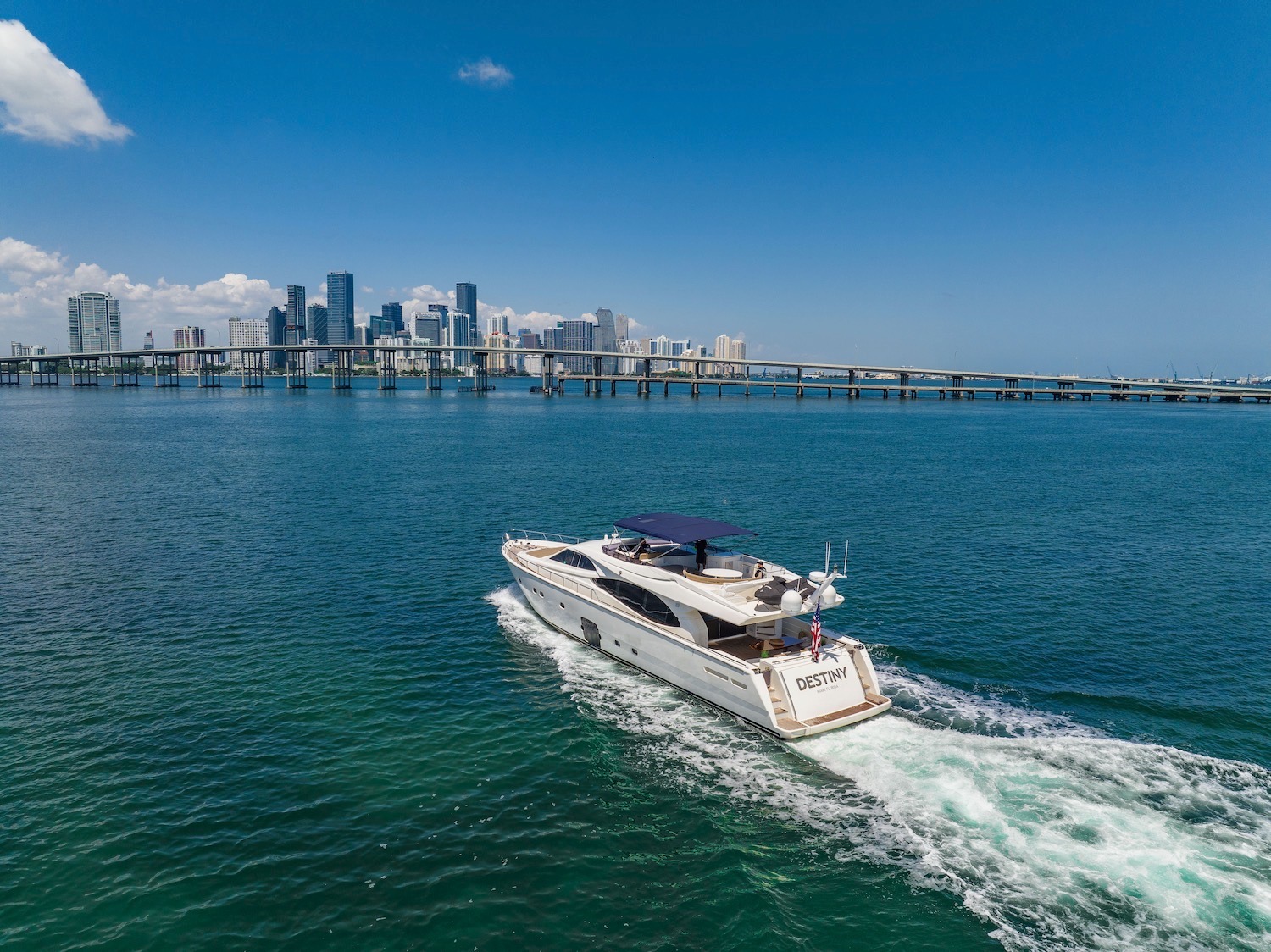 85ft Ferretti yacht rental Miami - elegant interior salon for corporate events and private gatherings