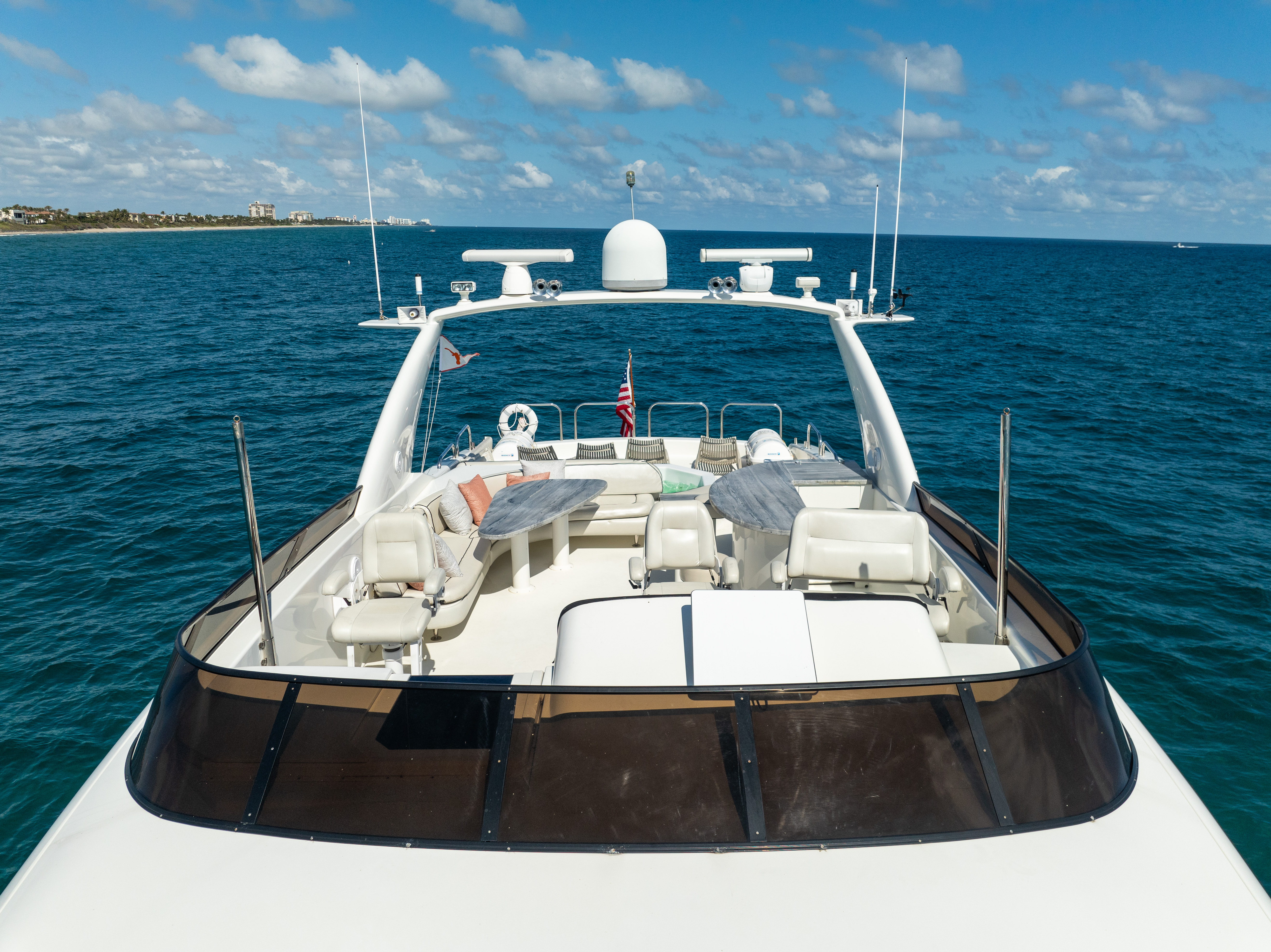94ft Lazzara yacht rental Miami - elegant interior salon for corporate events and private gatherings
