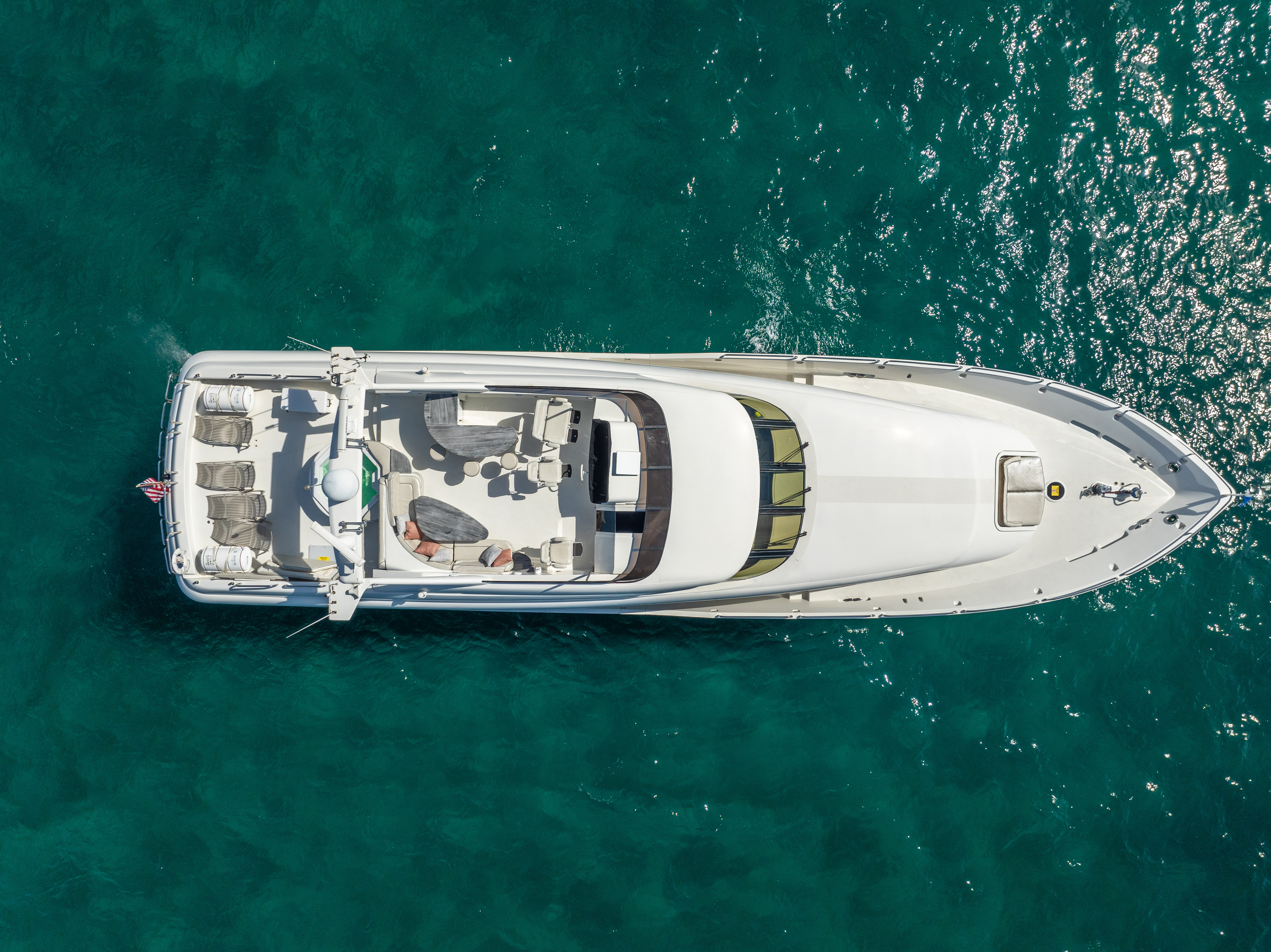 94ft Lazzara yacht rental Miami - stern swim platform with water access for snorkeling