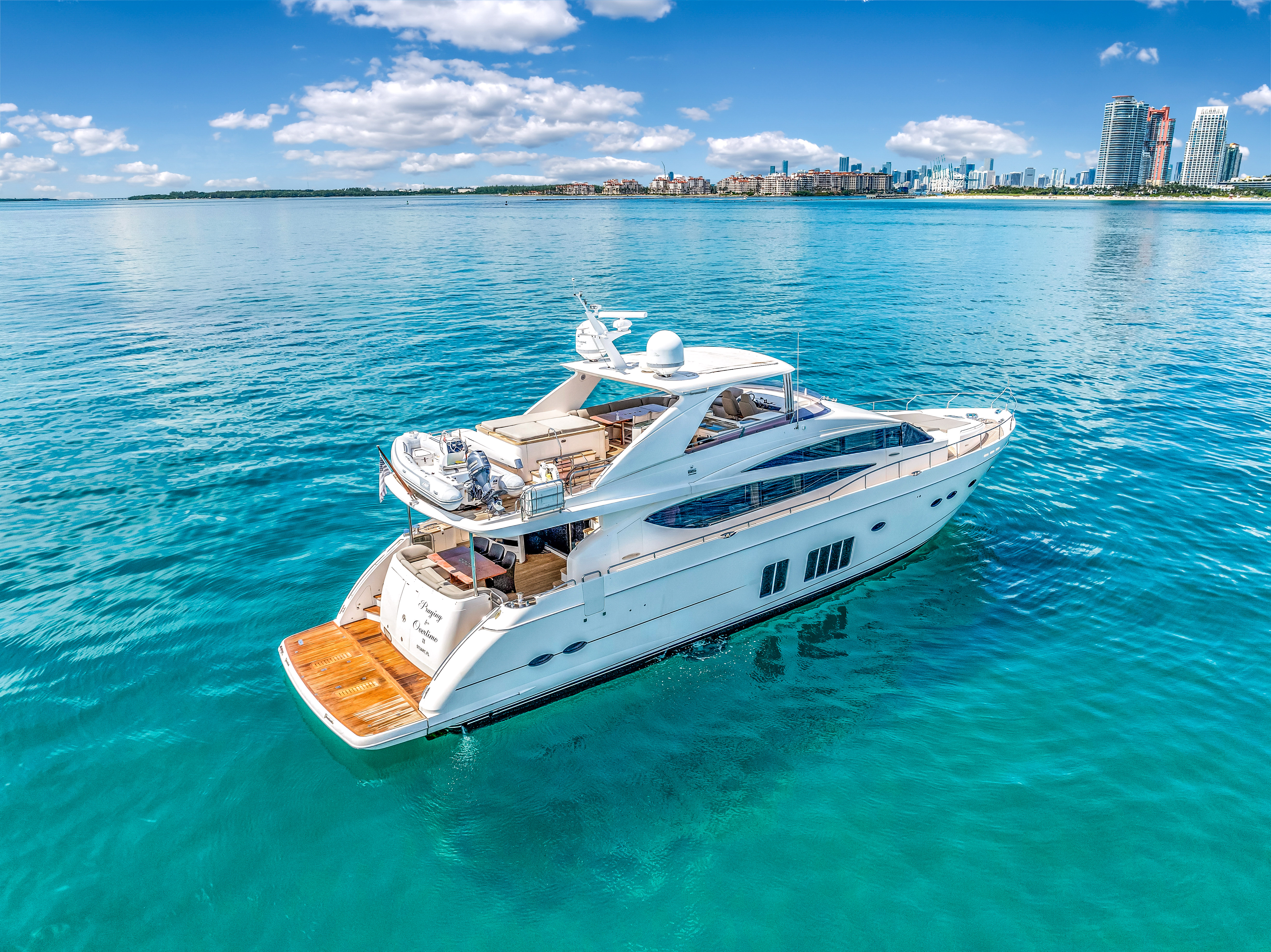 88ft Princess yacht rental Miami - flybridge with panoramic views of Miami skyline