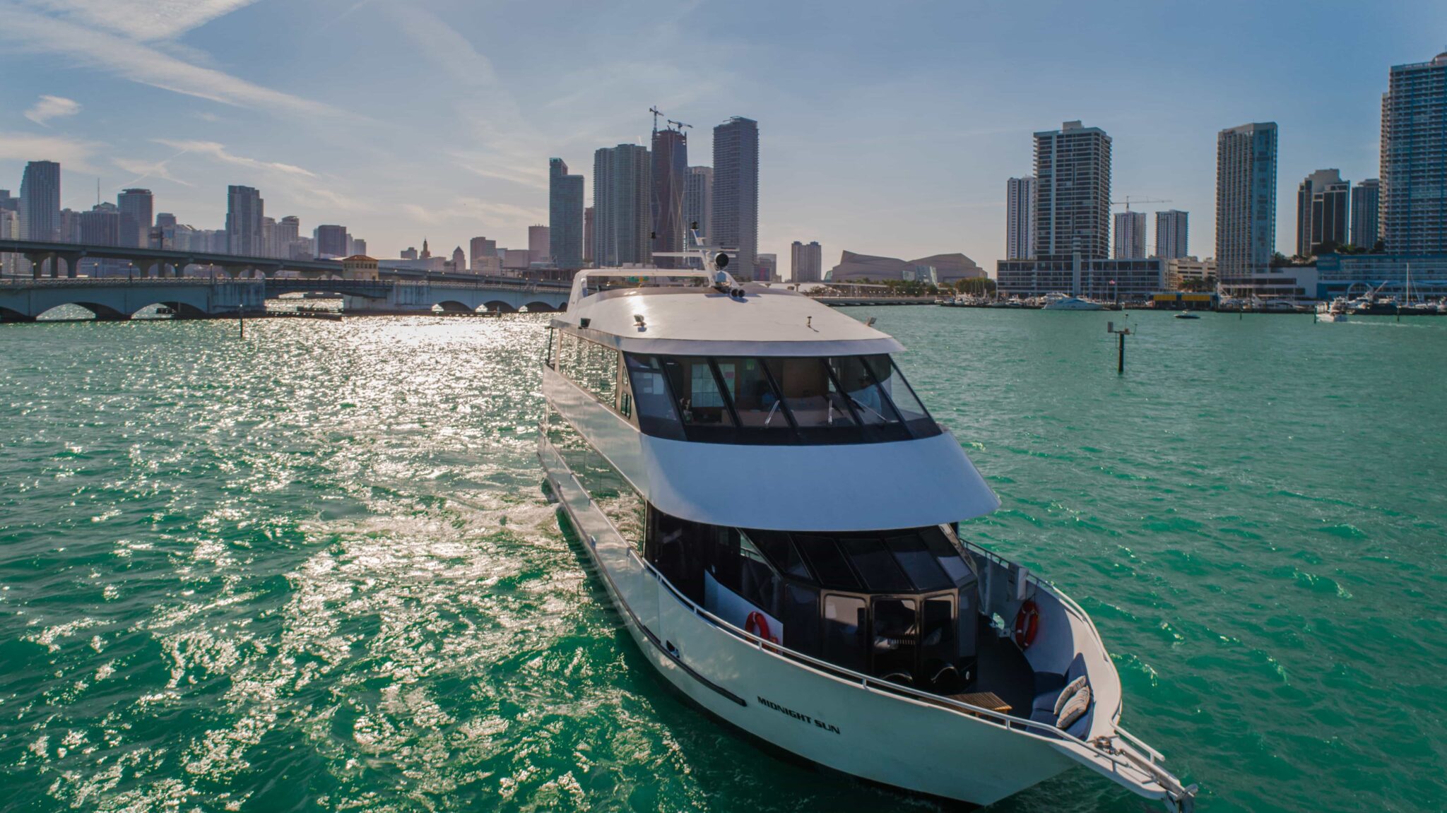 100ft Midsun yacht rental Miami - elegant interior salon for corporate events and private gatherings
