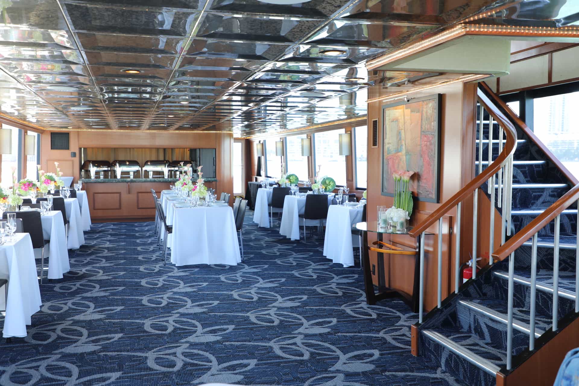 100ft Midsun yacht rental Miami - comfortable lounge area for group celebrations