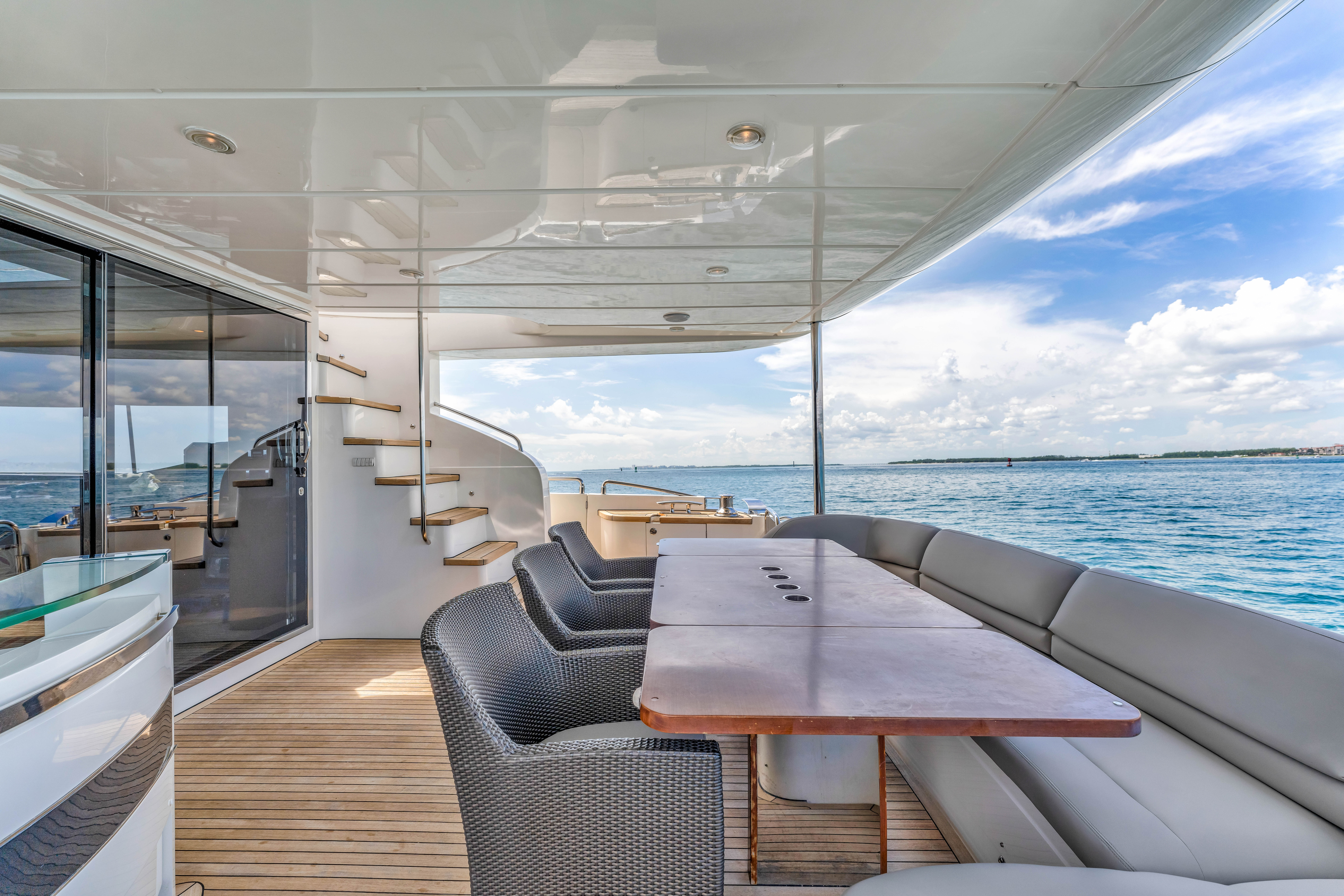 88ft Princess yacht rental Miami - comfortable lounge area for group celebrations