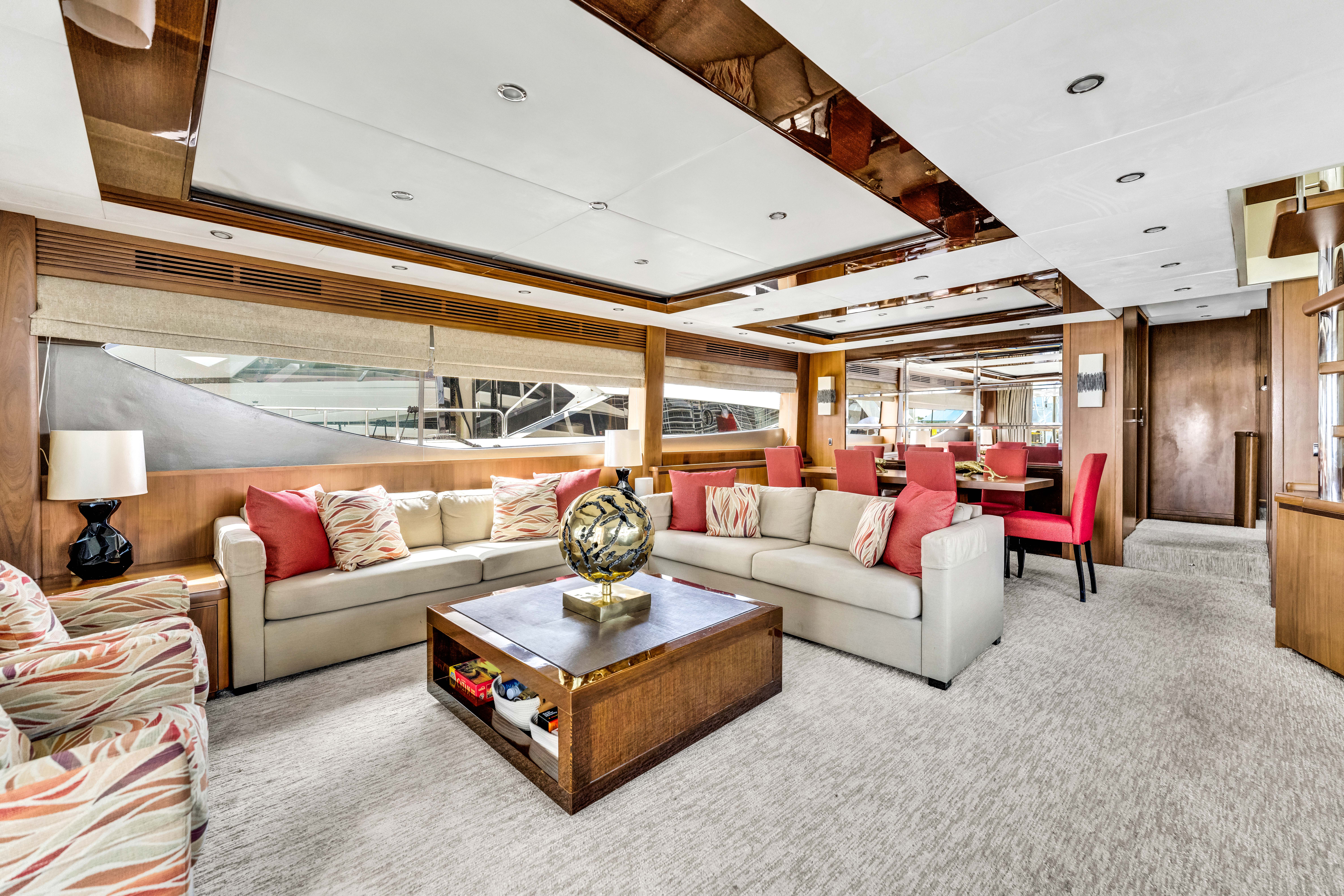 88ft Princess yacht rental Miami - comfortable lounge area for group celebrations