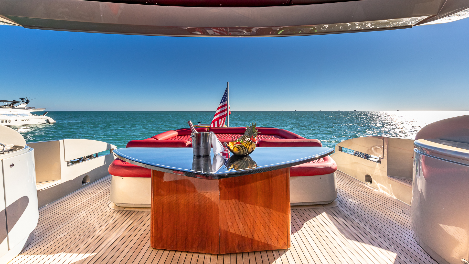 90ft Pershing yacht rental Miami - comfortable lounge area for group celebrations