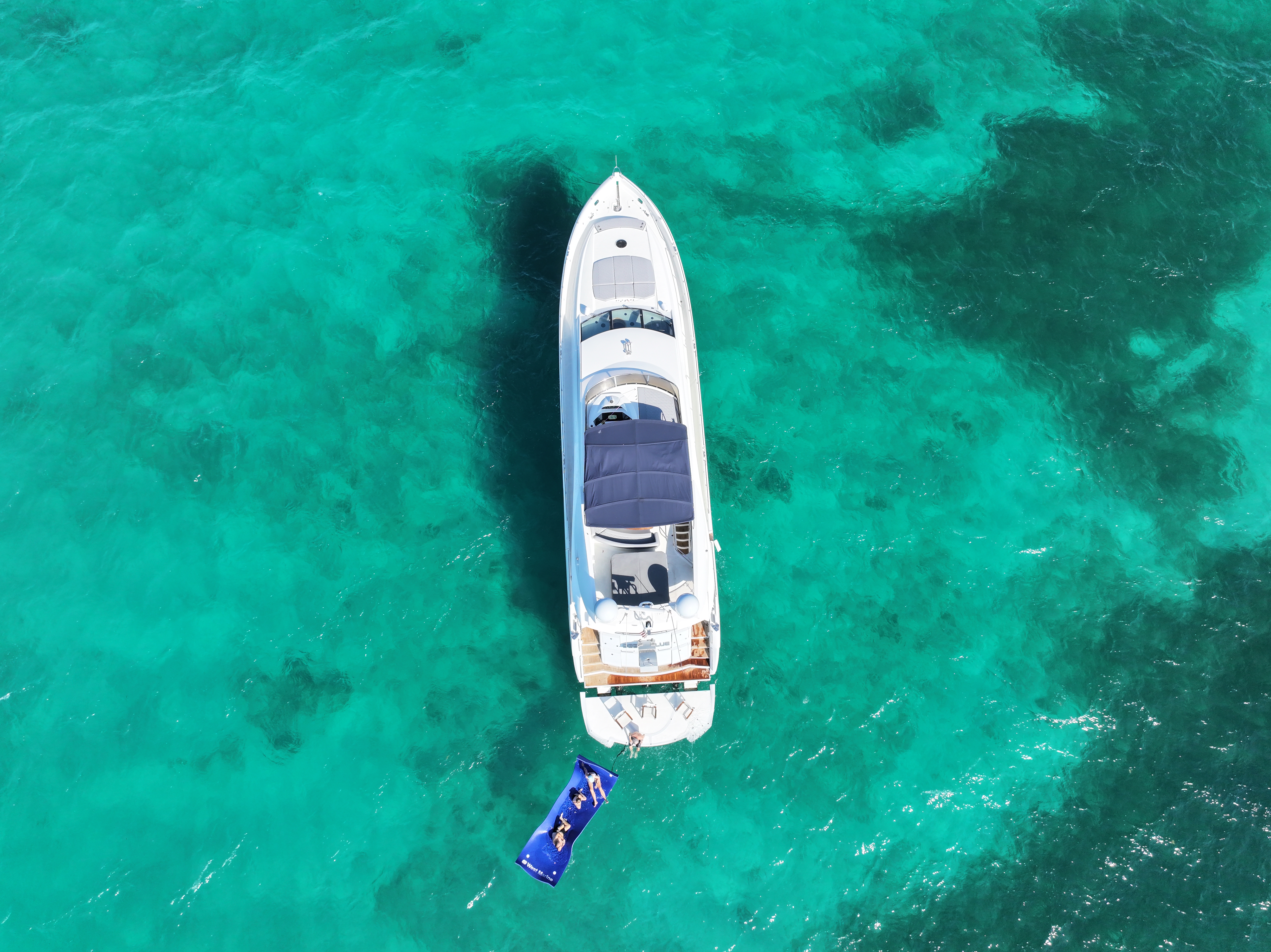 90ft Sunseeker DP yacht rental Miami - elegant interior salon for corporate events and private gatherings