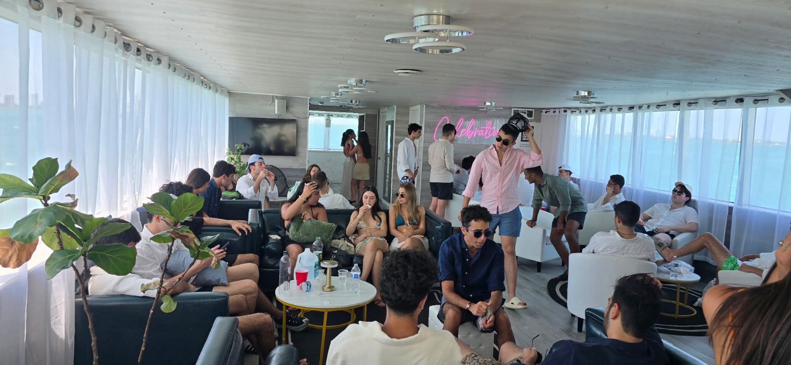 75ft Celeb yacht rental Miami - flybridge with panoramic views of Miami skyline