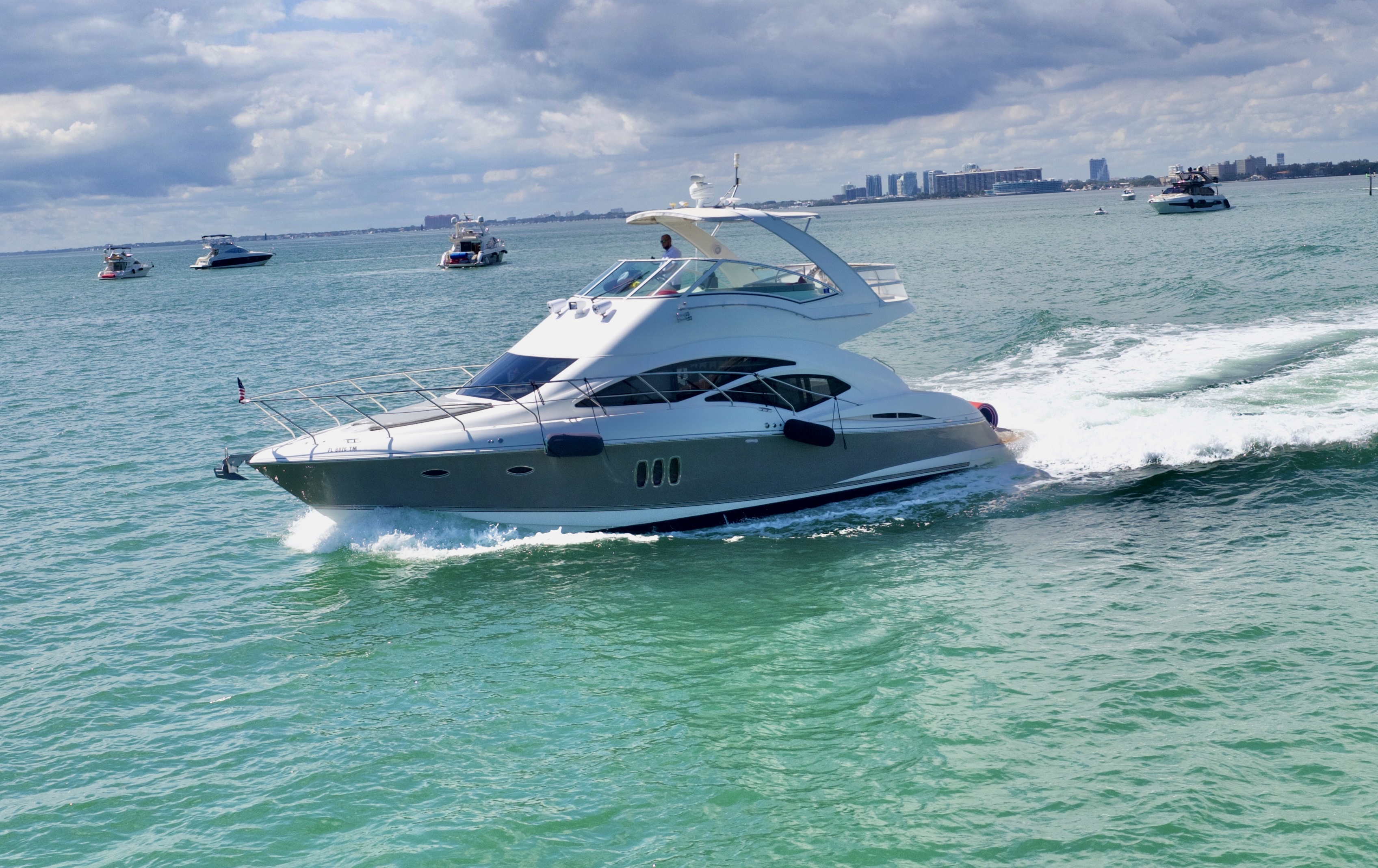 50ft Cruiser Sport Fly yacht rental Miami - spacious deck area ideal for sunset cruises and bachelorette parties