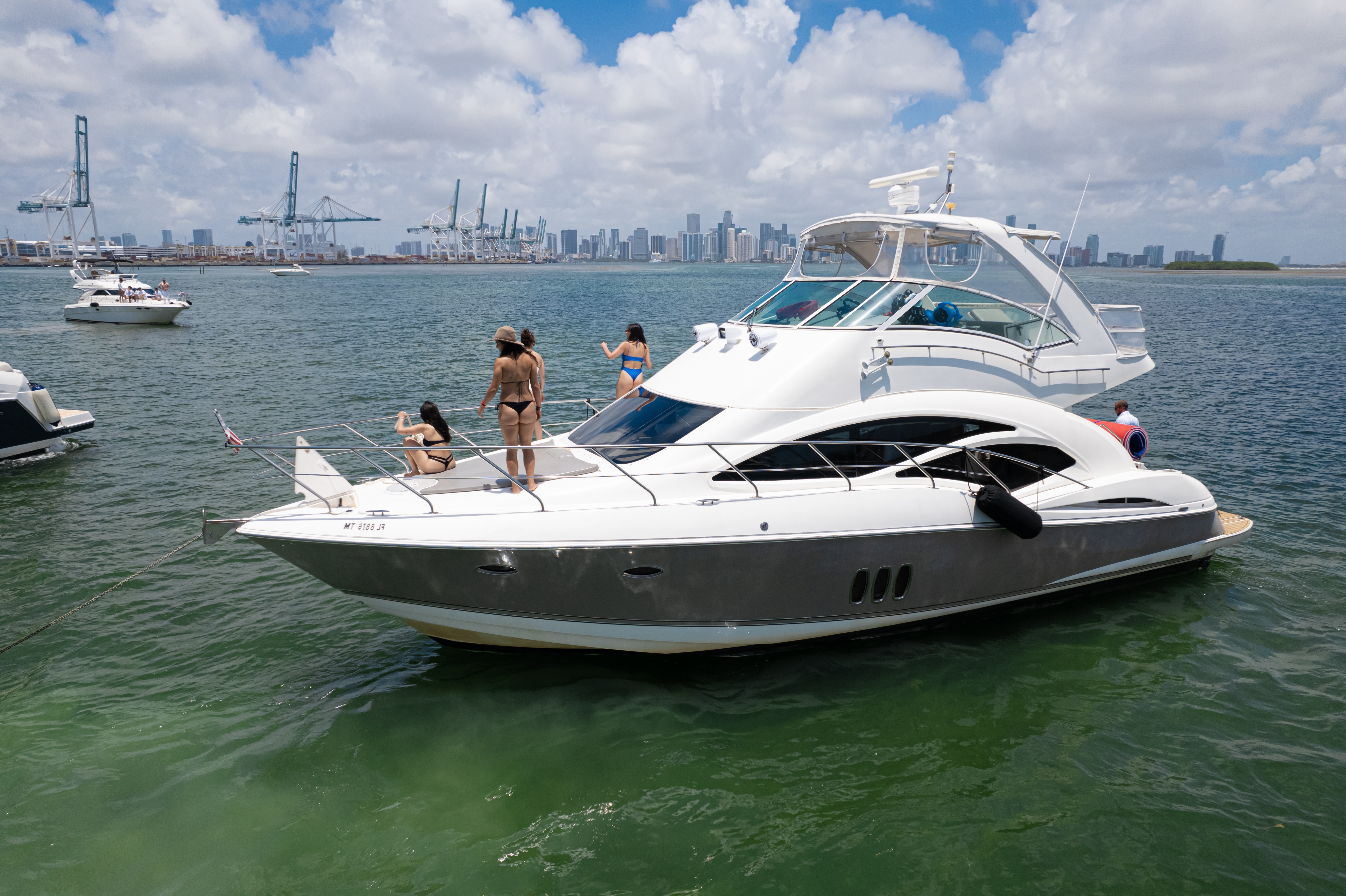 50ft Cruiser Sport Fly yacht rental Miami - bow seating area perfect for sunbathing and relaxation