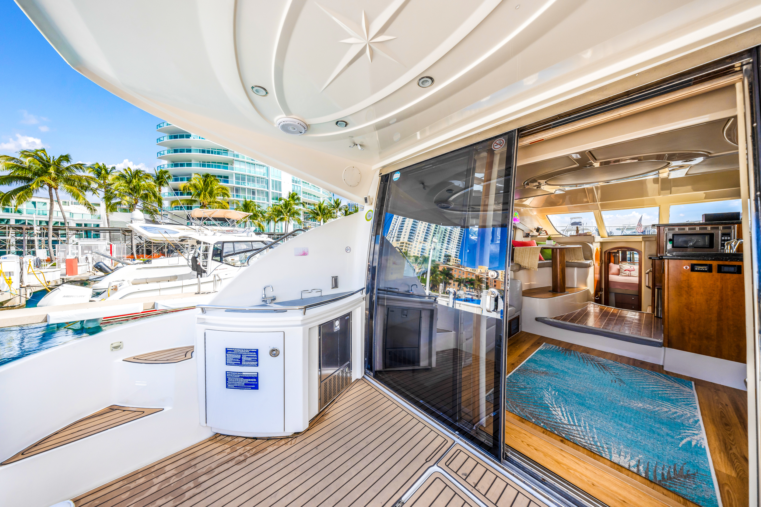 50ft Cruiser Sport Fly yacht rental Miami - navigation bridge and helm station