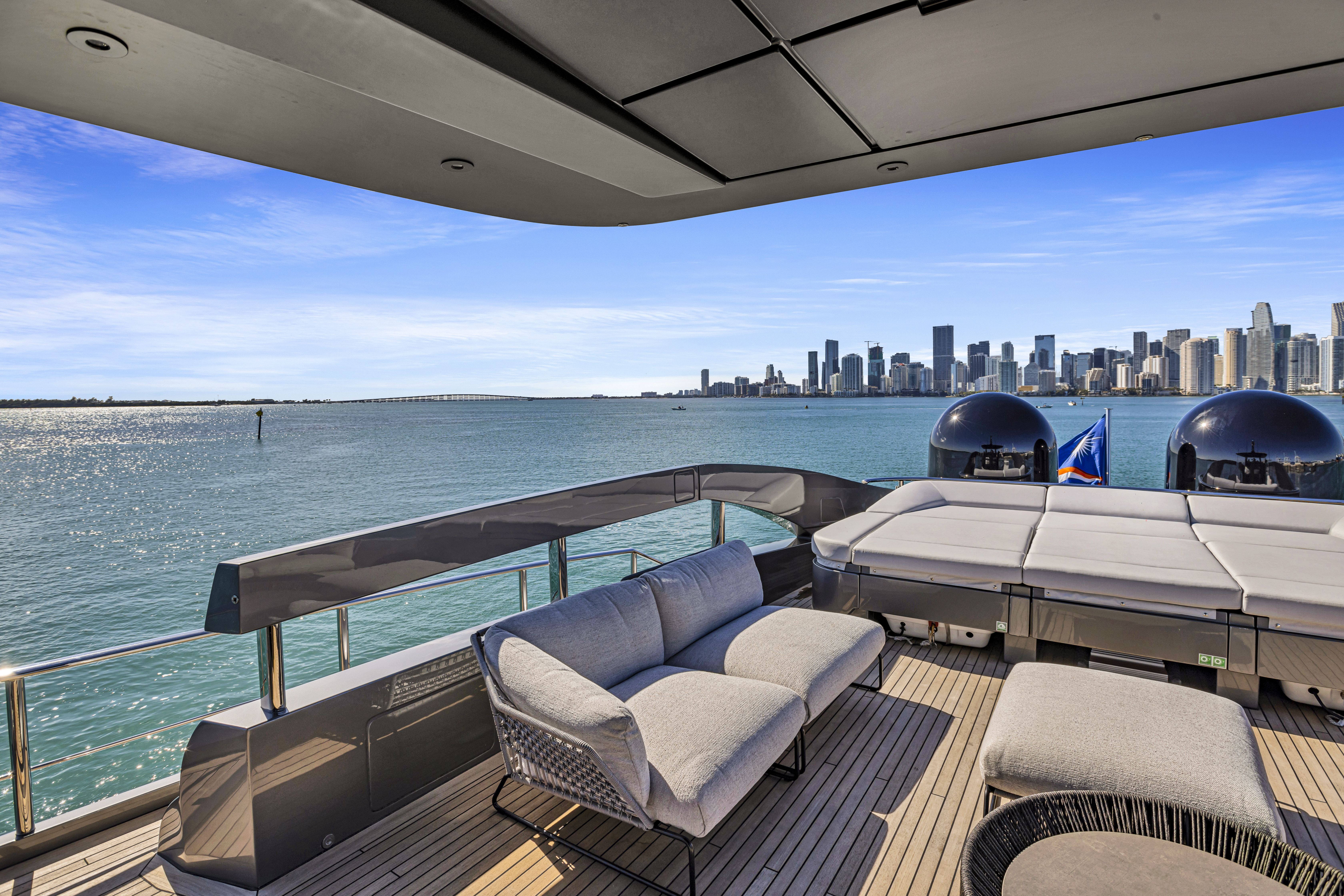 116ft Pershing yacht rental Miami - elegant interior salon for corporate events and private gatherings