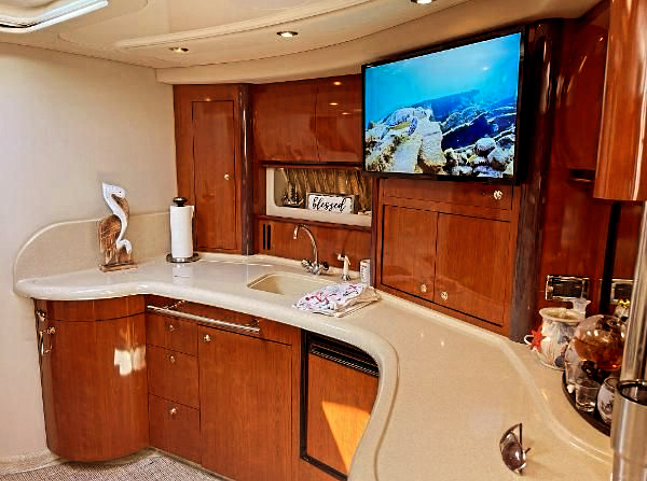 50ft Sundancer yacht rental Miami - stern swim platform with water access for snorkeling