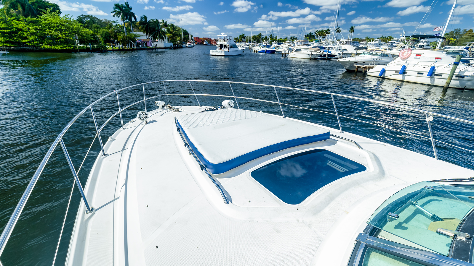 50ft Sundancer yacht rental Miami - flybridge with panoramic views of Miami skyline