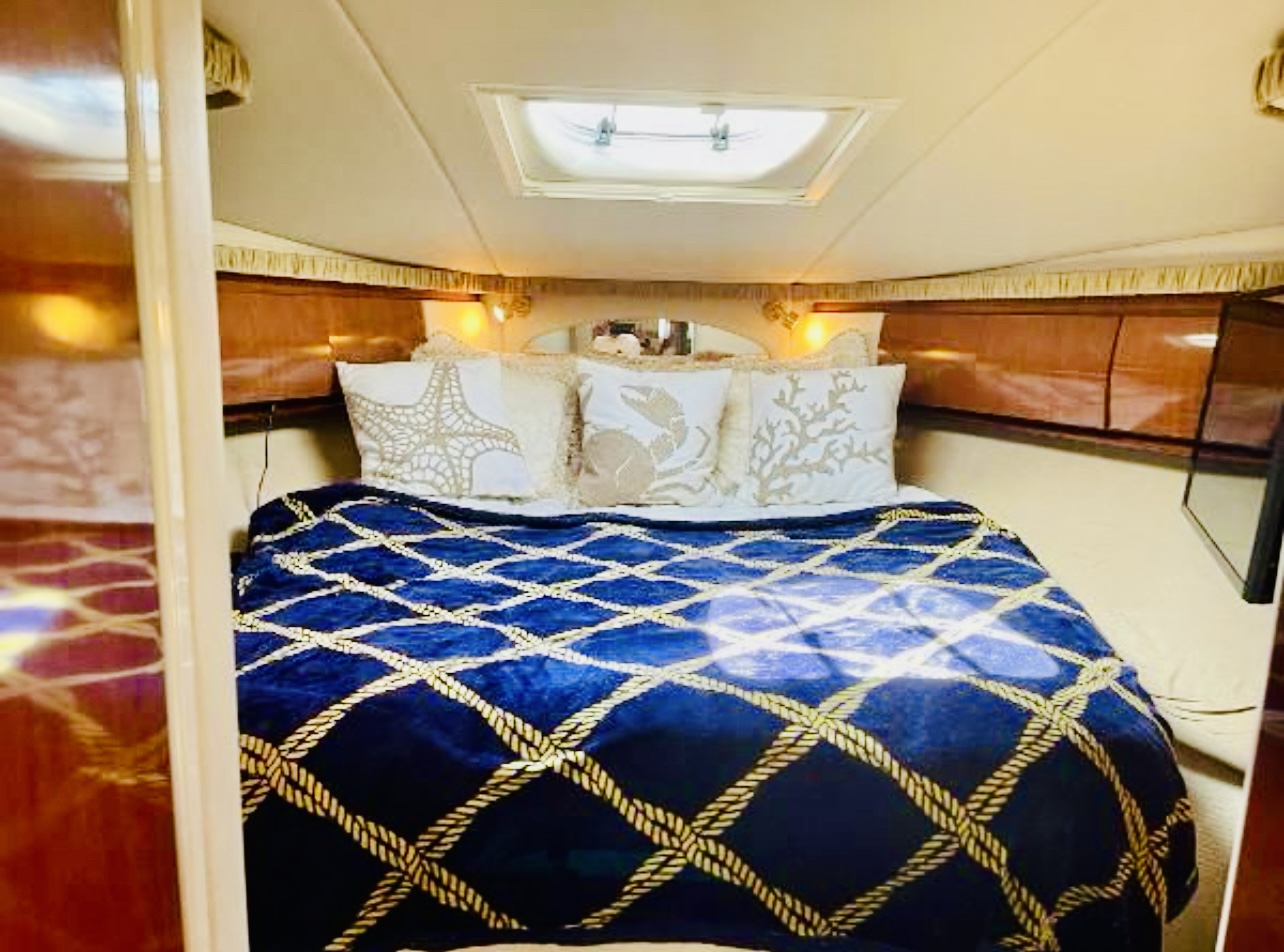 50ft Sundancer yacht rental Miami - navigation bridge and helm station