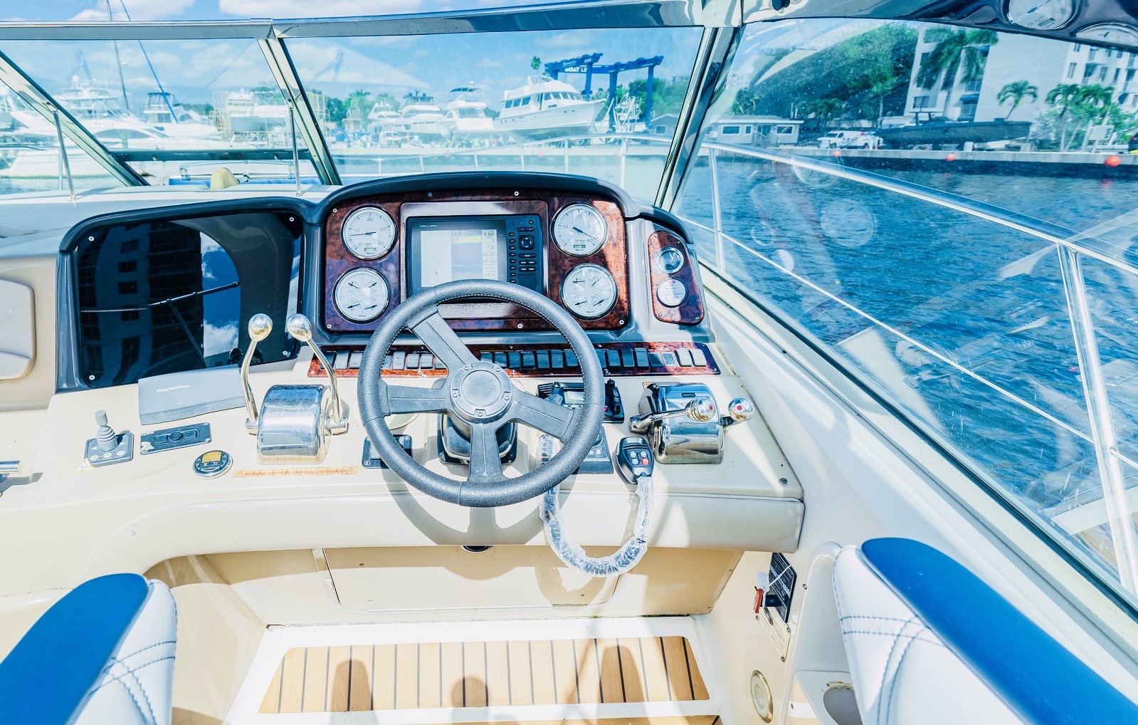 50ft Sundancer yacht rental Miami - navigation bridge and helm station