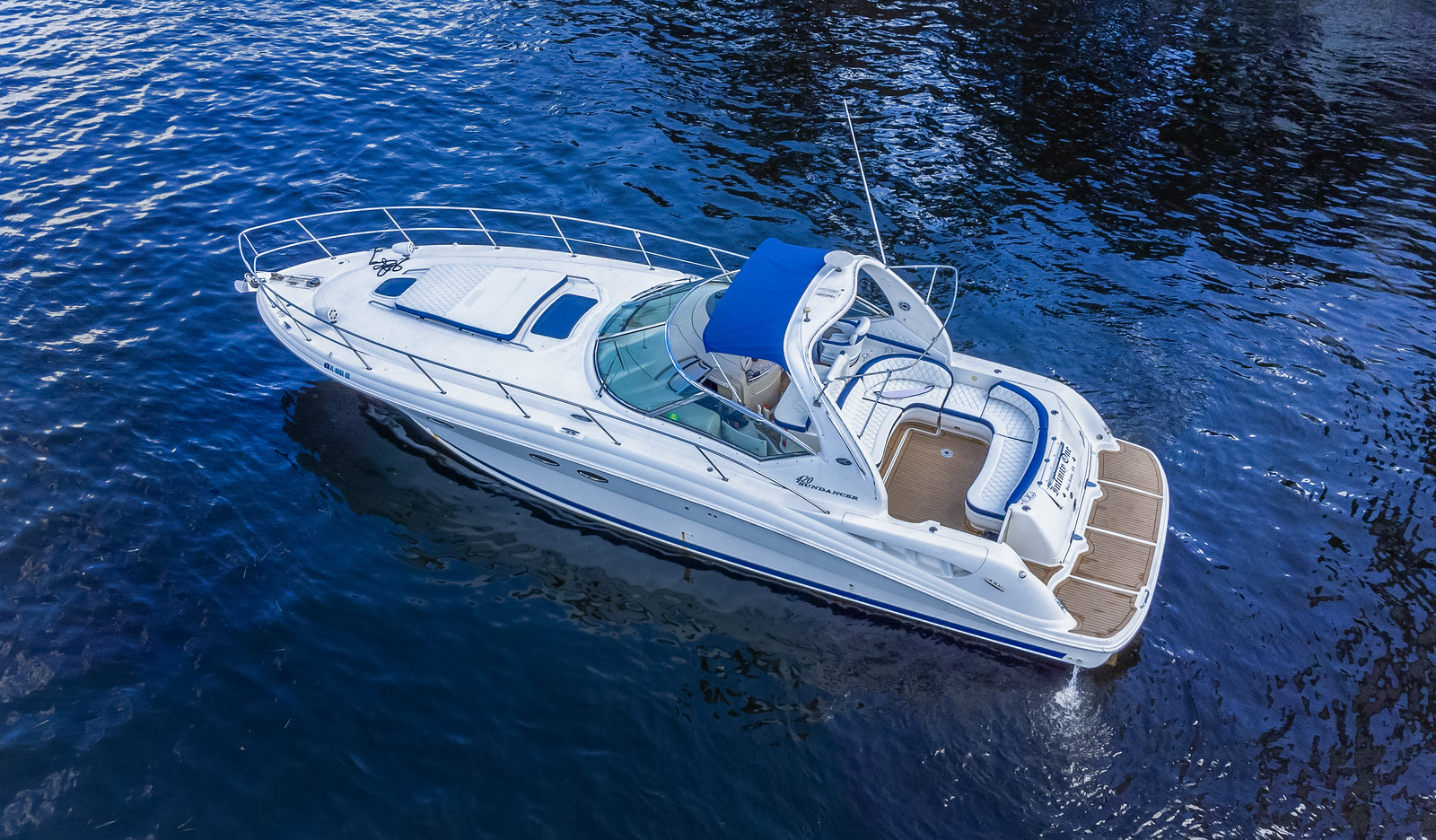 50ft Sundancer yacht rental Miami - spacious deck area ideal for sunset cruises and bachelorette parties