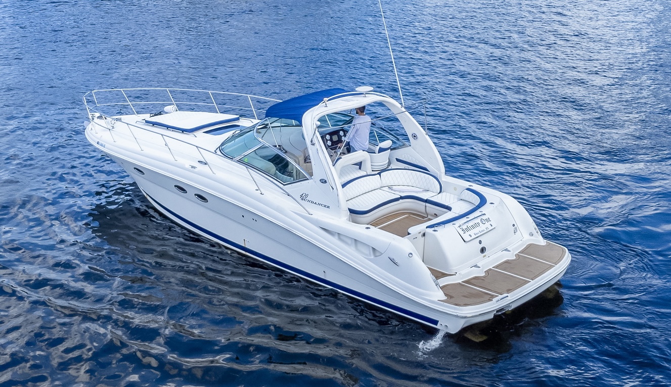 50ft Sundancer yacht rental Miami - elegant interior salon for corporate events and private gatherings