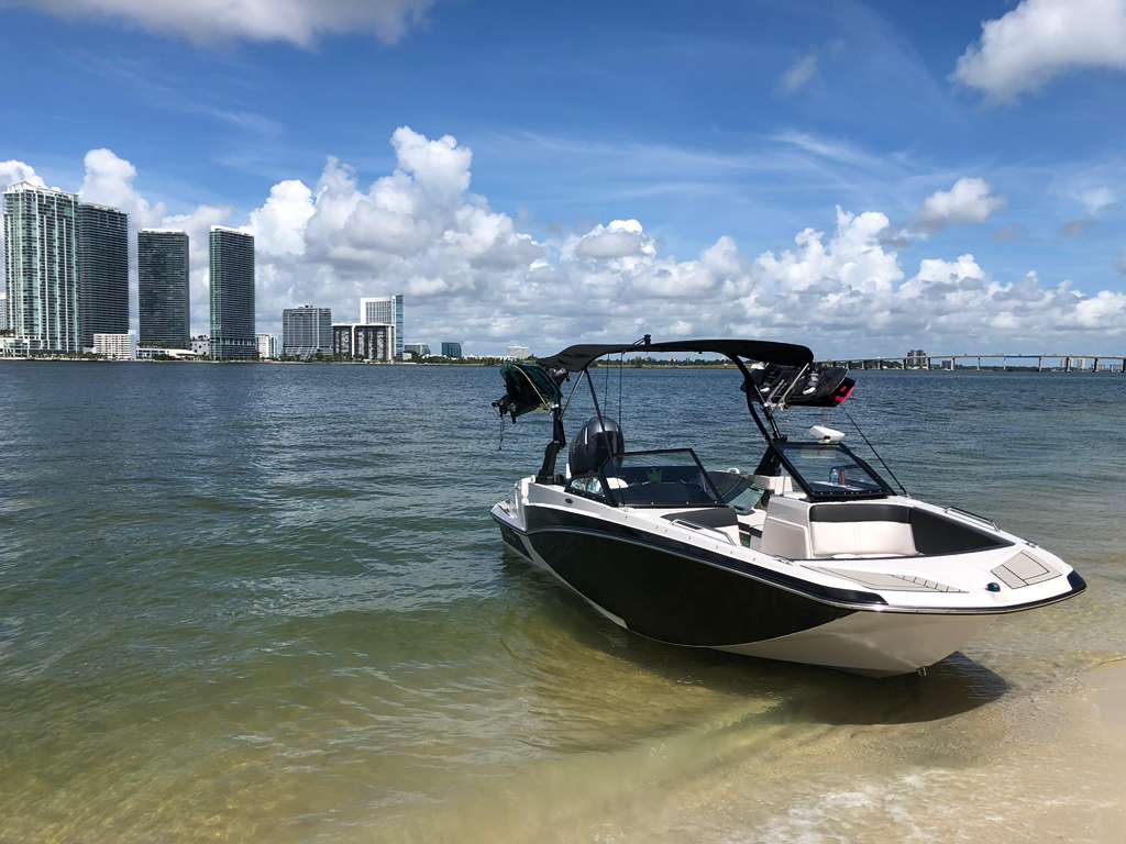 24ft Glastron Haulover Sandbar yacht rental Miami - flybridge with panoramic views of Miami skyline