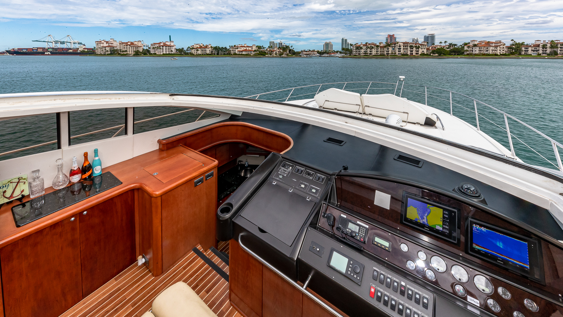75ft Sunseeker Aquah yacht rental Miami - flybridge with panoramic views of Miami skyline