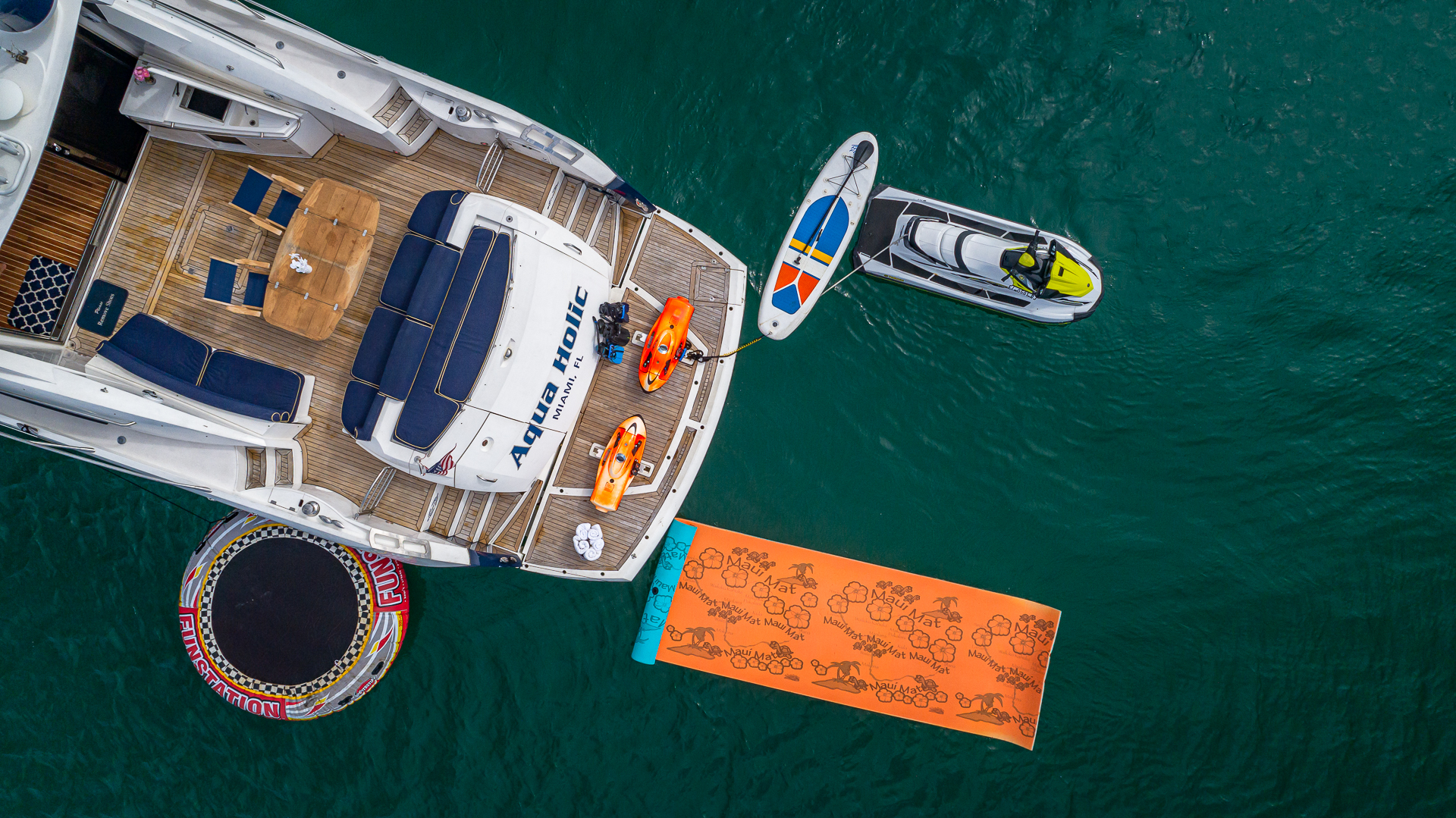 75ft Sunseeker Aquah yacht rental Miami - flybridge with panoramic views of Miami skyline