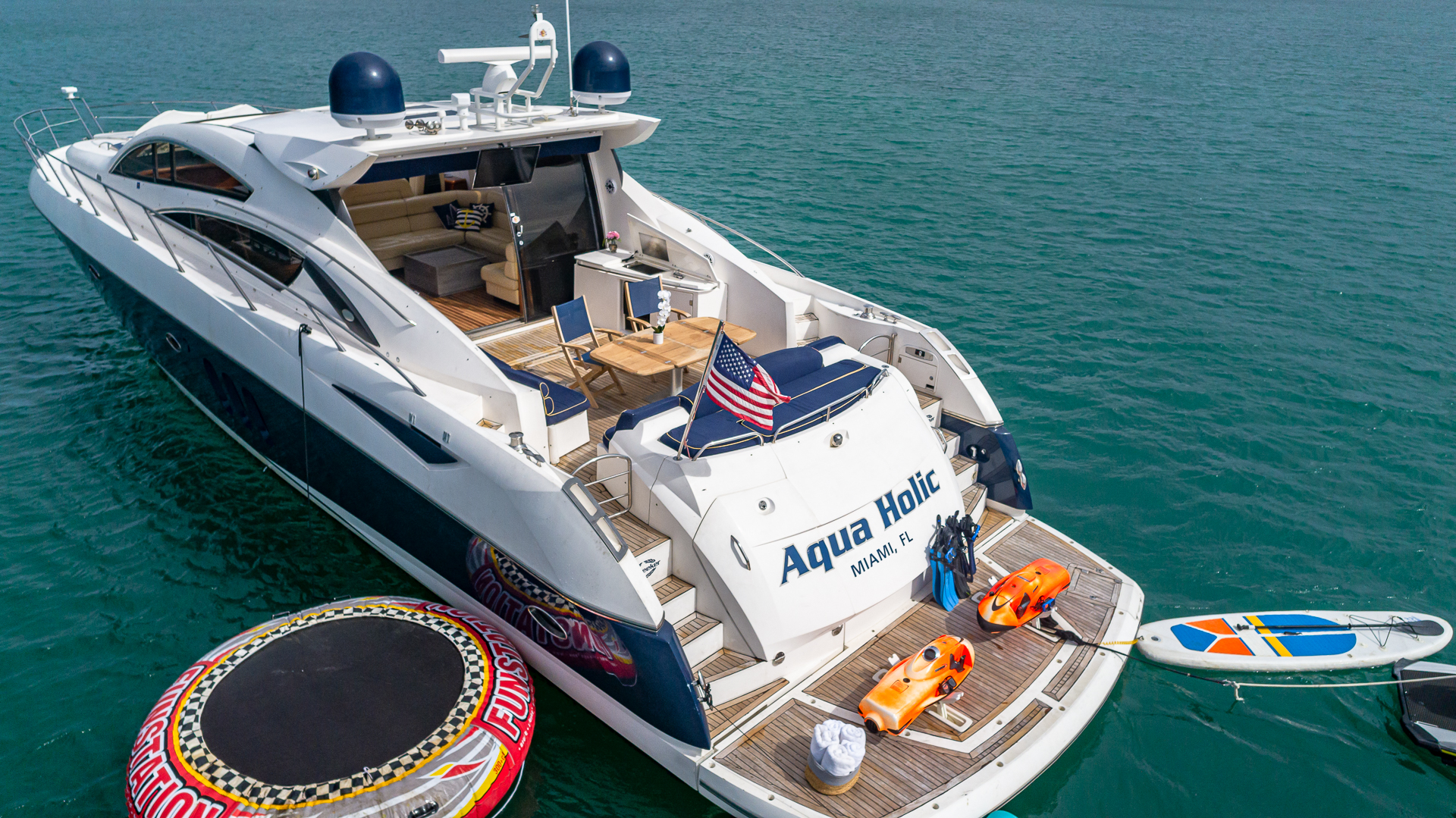 75ft Sunseeker Aquah yacht rental Miami - elegant interior salon for corporate events and private gatherings