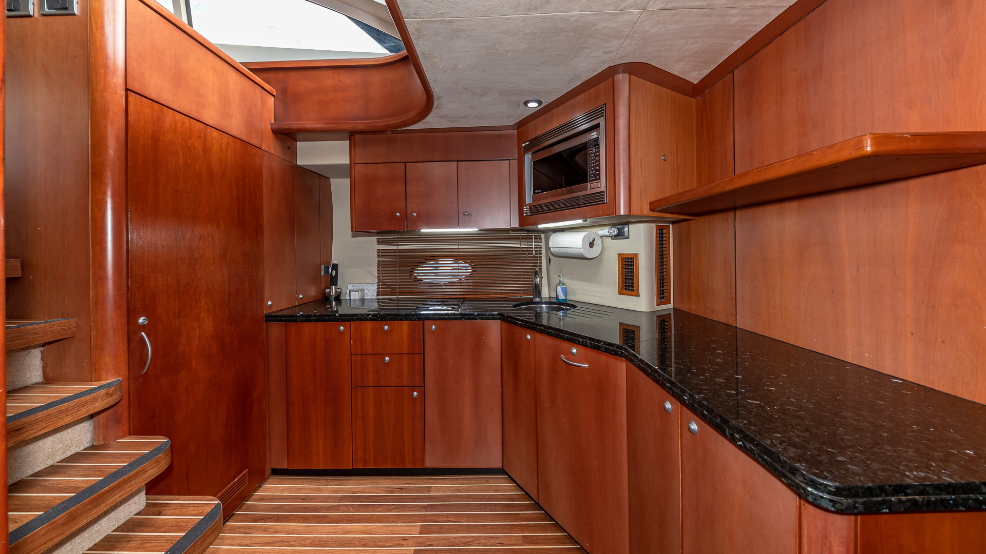 75ft Sunseeker Aquah yacht rental Miami - flybridge with panoramic views of Miami skyline