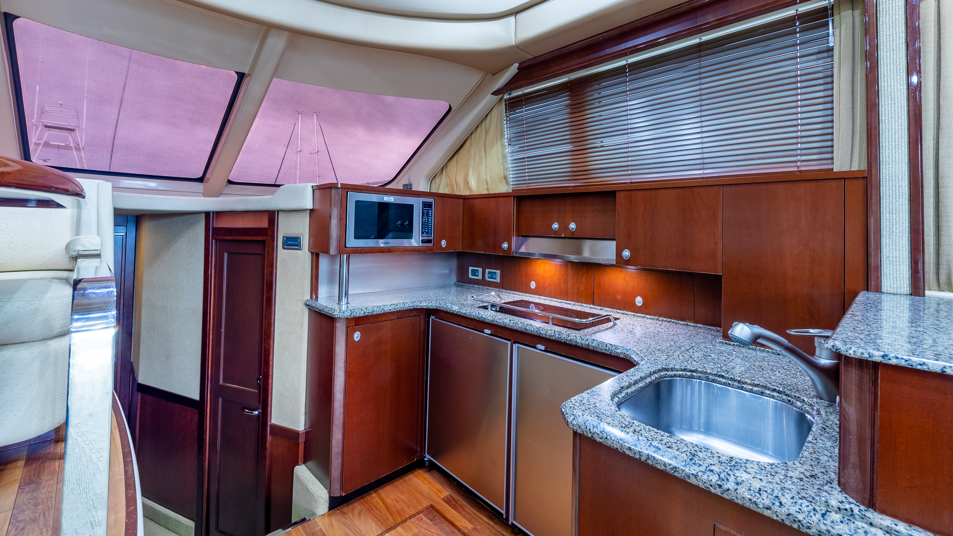55ft Sea Ray J yacht rental Miami - elegant interior salon for corporate events and private gatherings