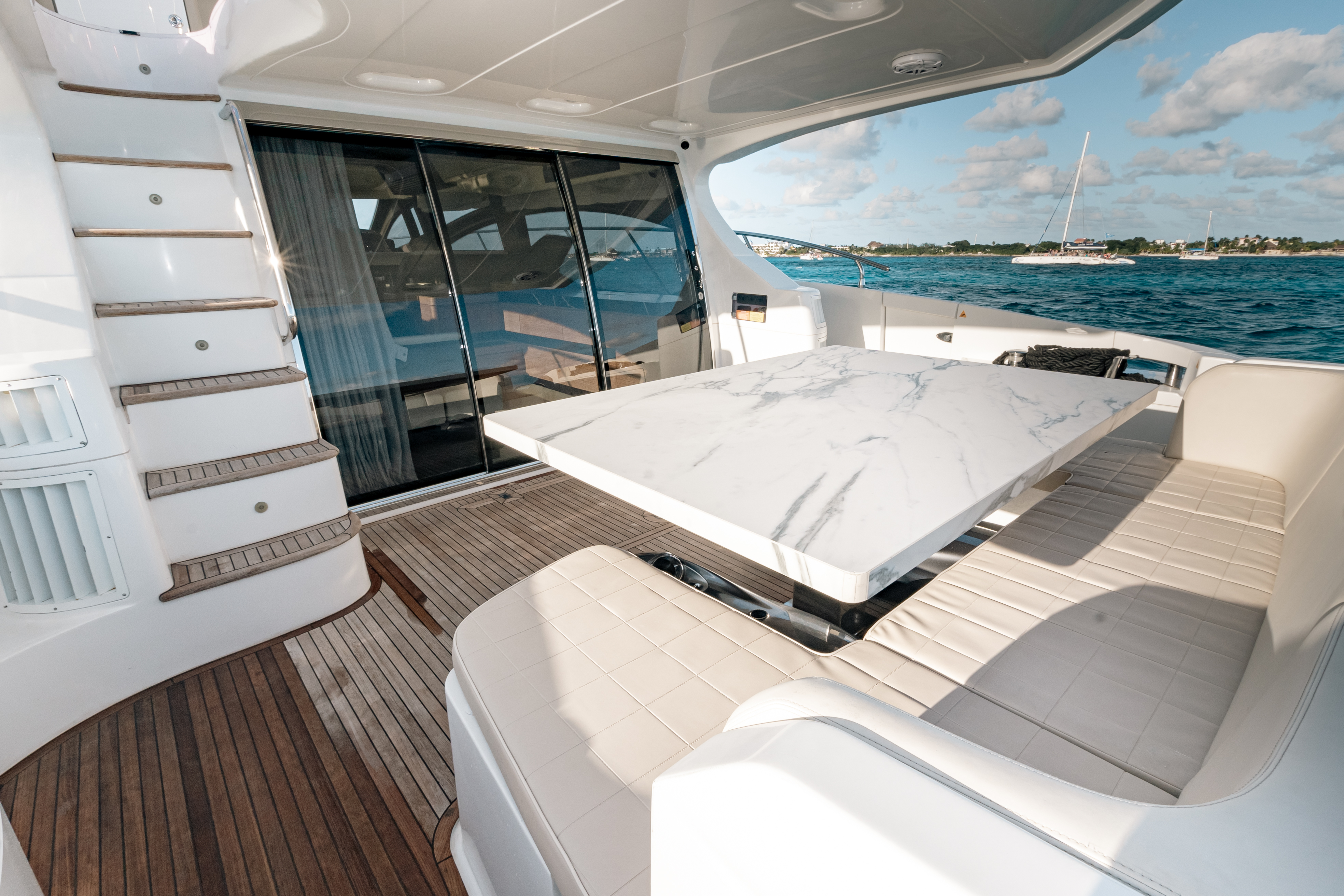 65ft Azimut yacht rental Miami - spacious deck area ideal for sunset cruises and bachelorette parties