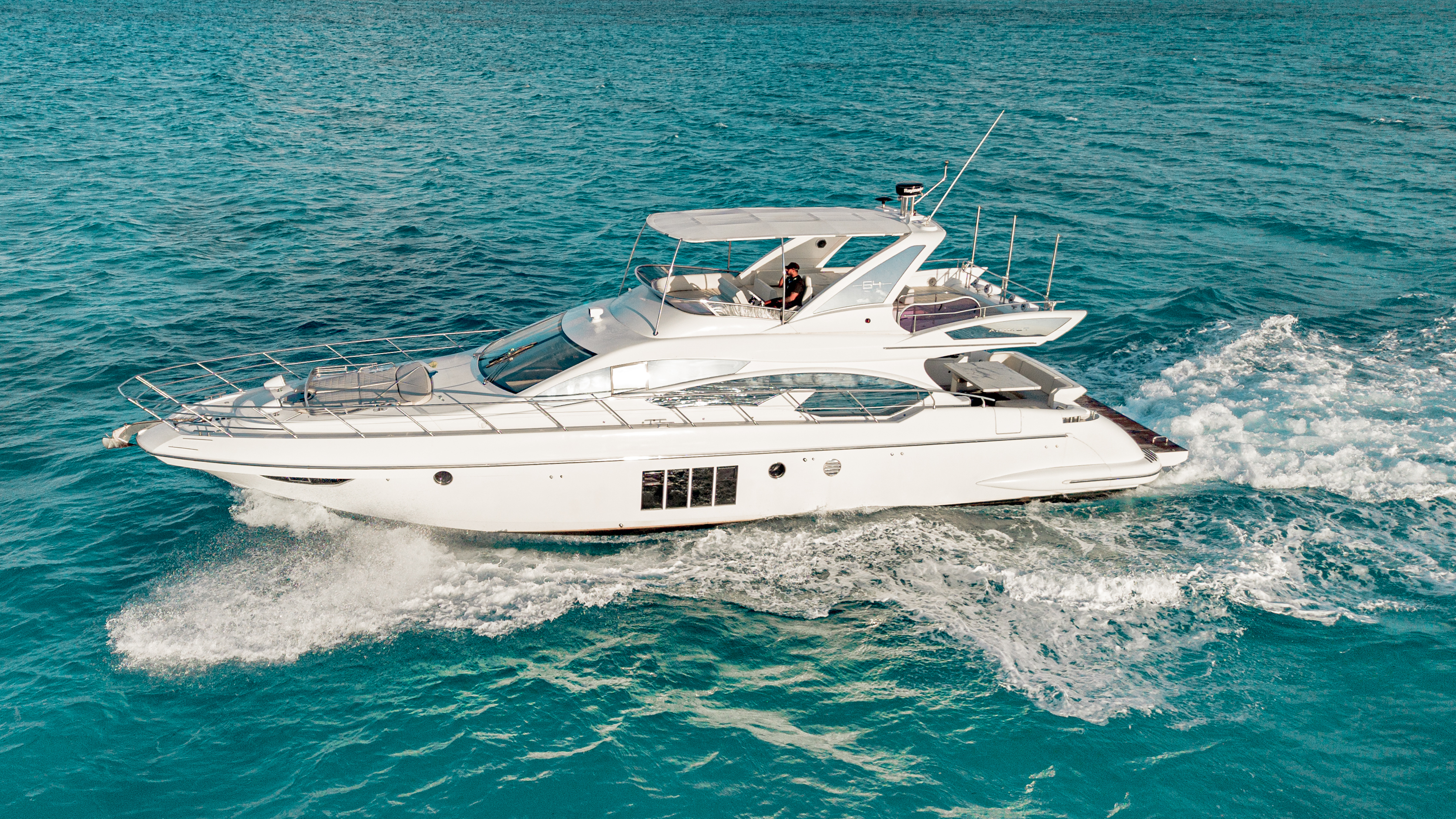 65ft Azimut yacht rental Miami - flybridge with panoramic views of Miami skyline