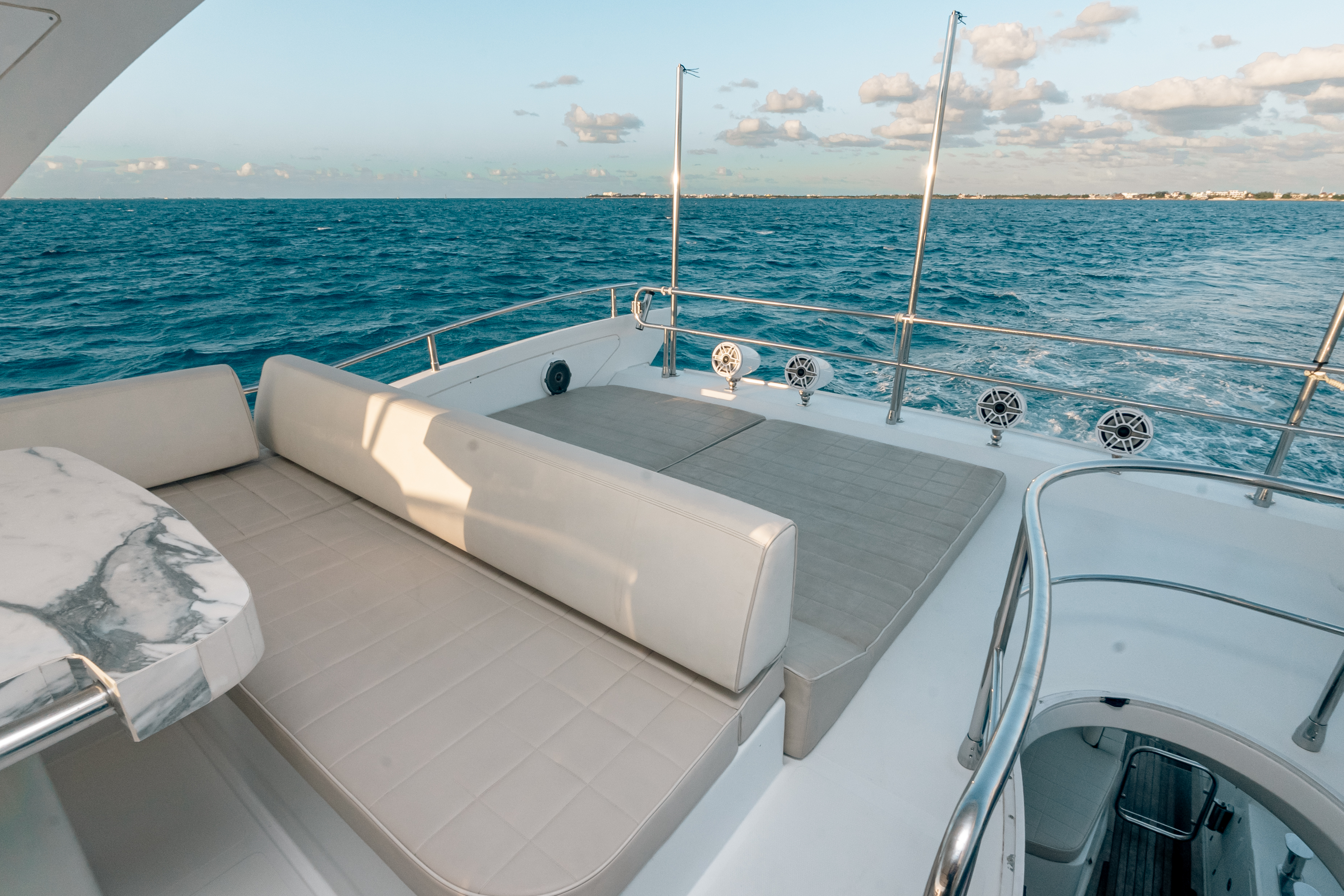 65ft Azimut yacht rental Miami - spacious deck area ideal for sunset cruises and bachelorette parties