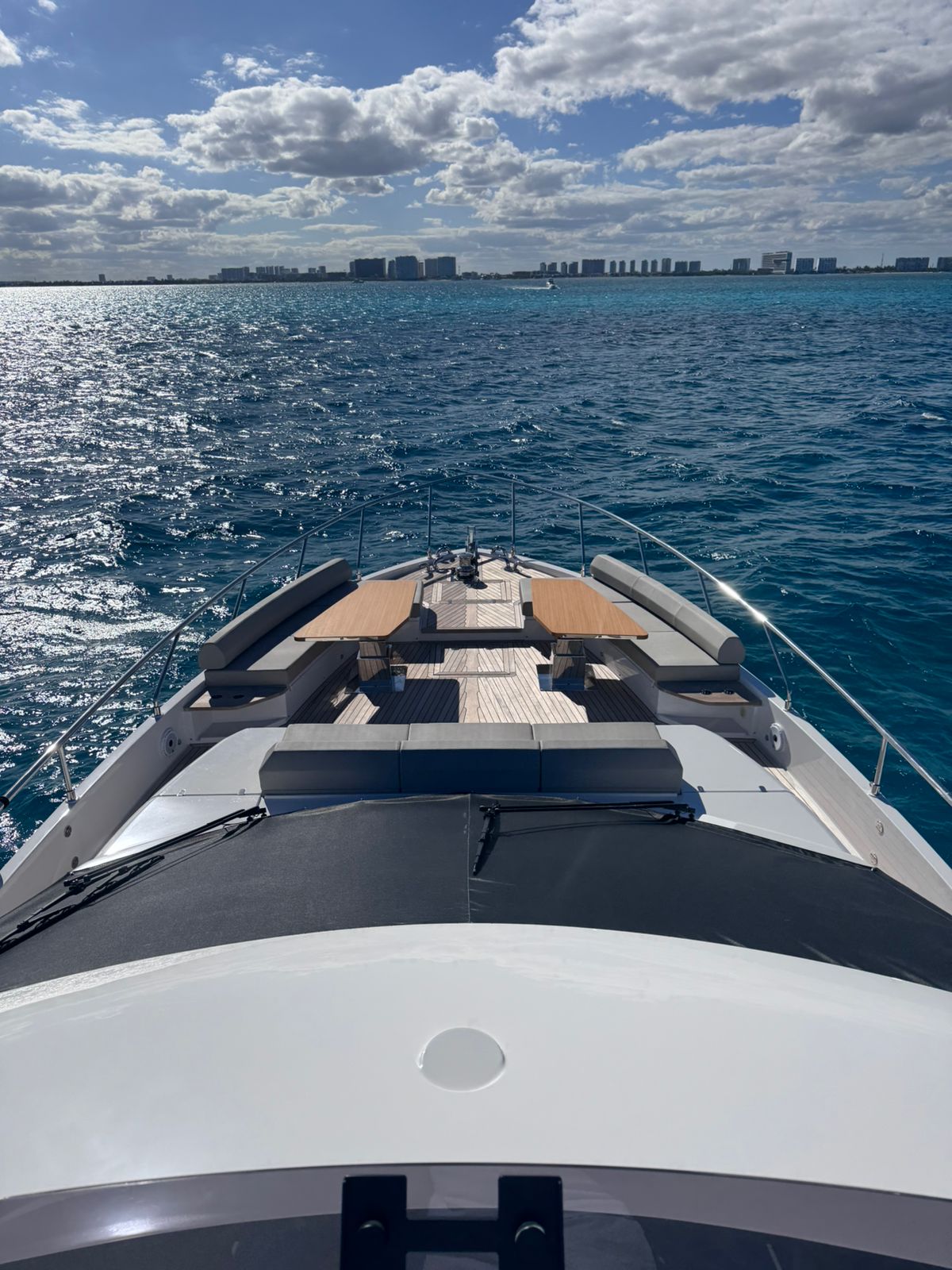 70ft Ferretti yacht rental Miami - bow seating area perfect for sunbathing and relaxation
