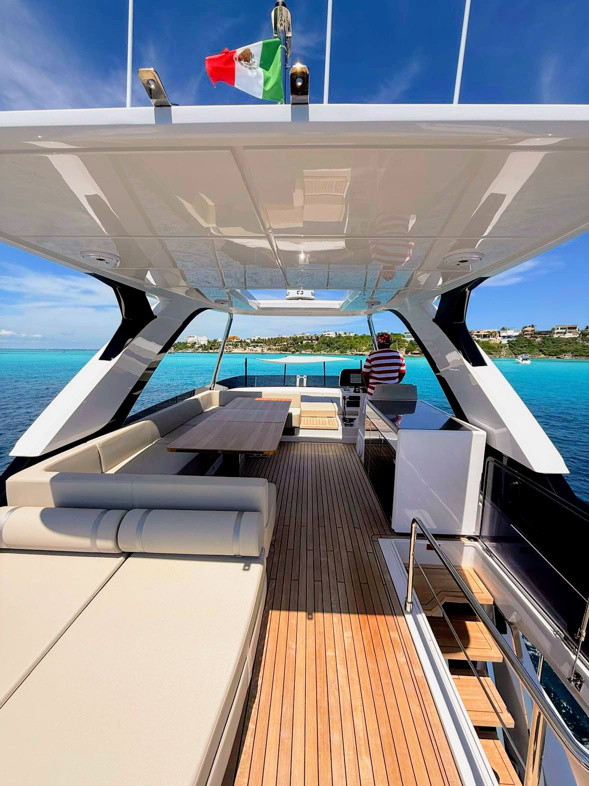 70ft Ferretti yacht rental Miami - stern swim platform with water access for snorkeling