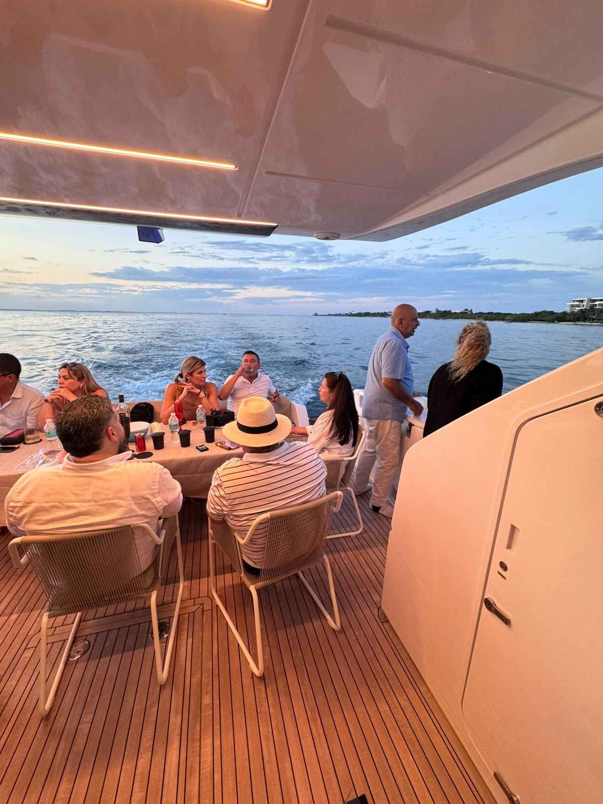70ft Ferretti yacht rental Miami - flybridge with panoramic views of Miami skyline