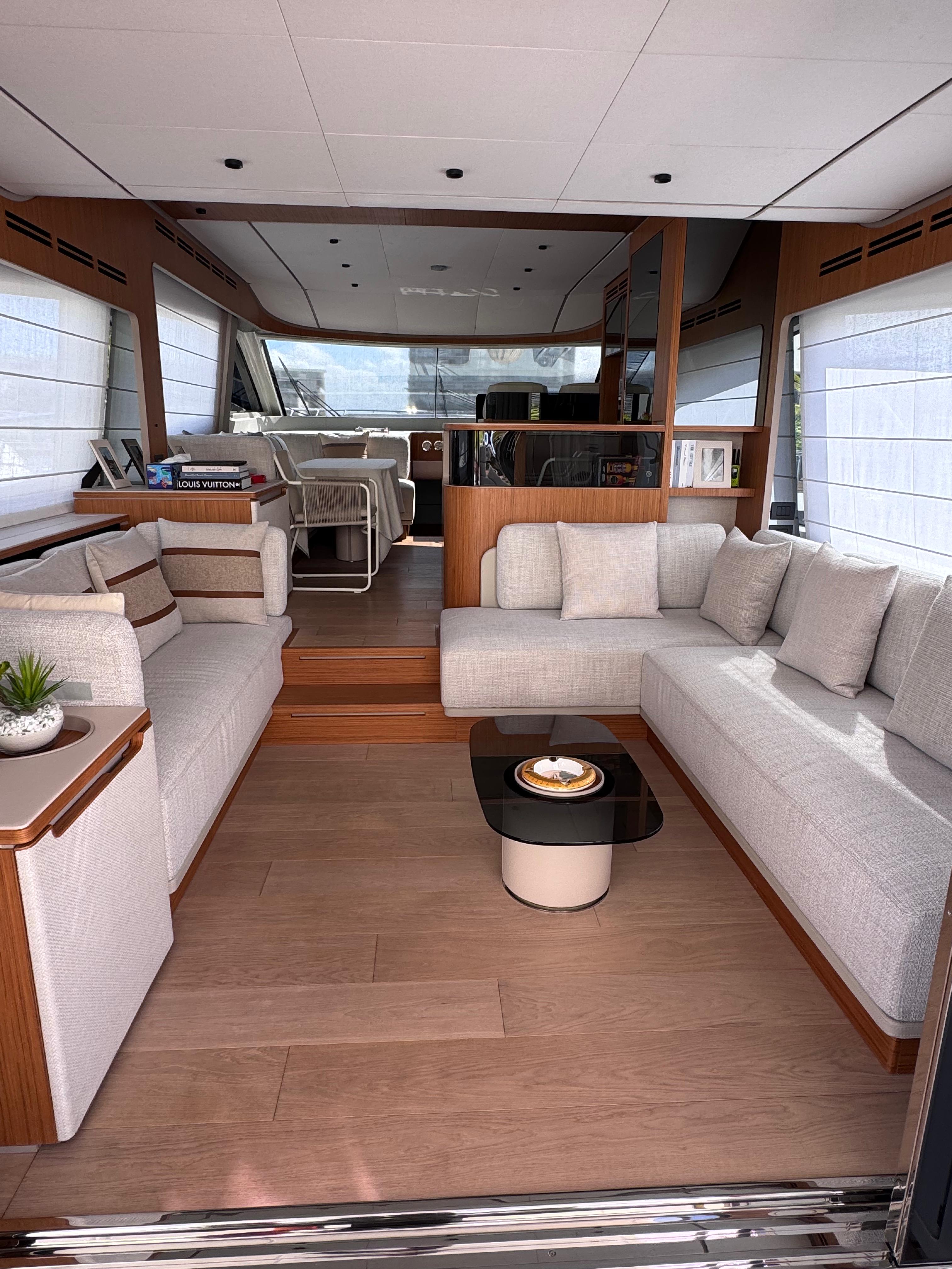 70ft Ferretti yacht rental Miami - comfortable lounge area for group celebrations